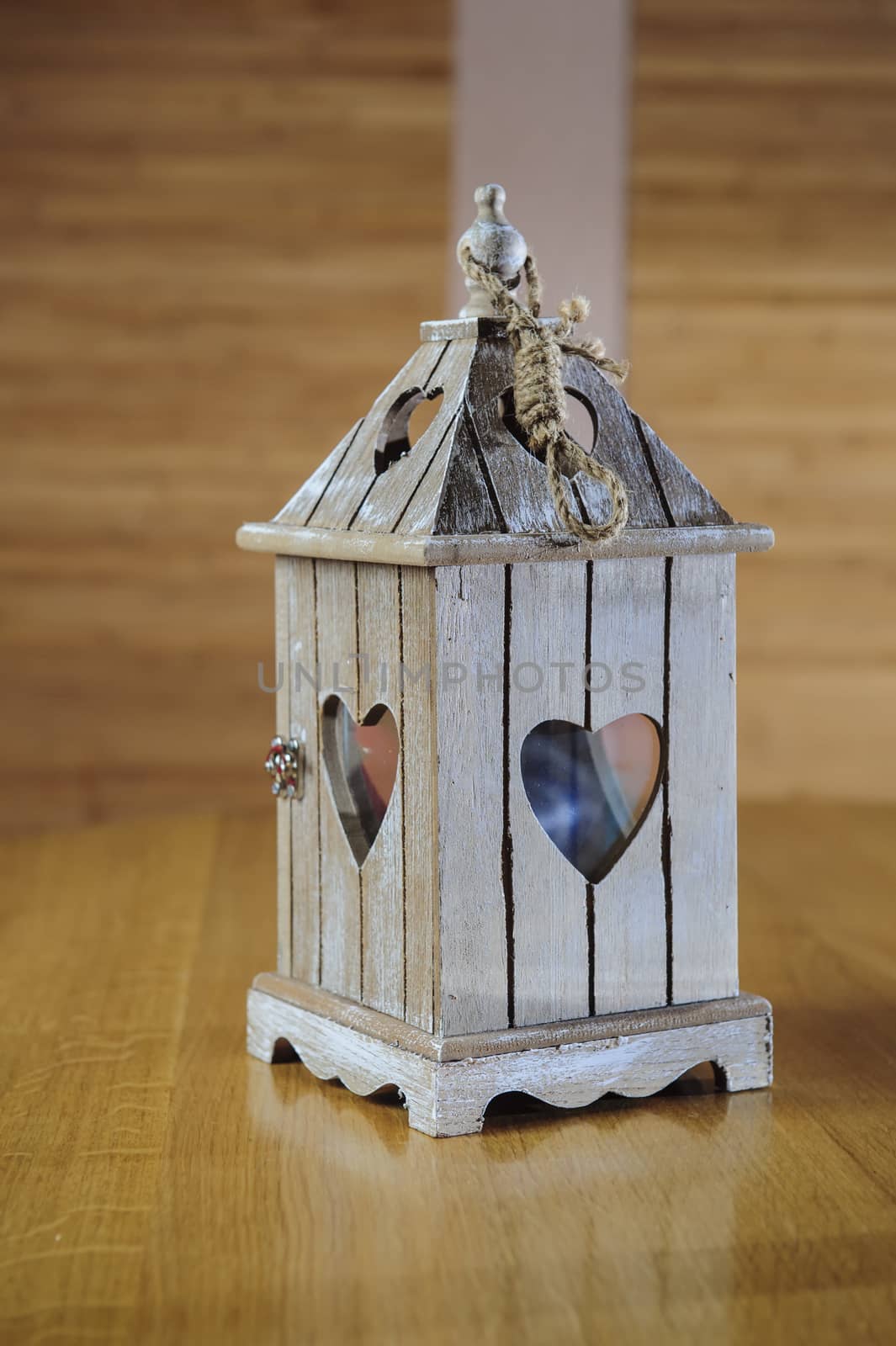 wooden candlestick with heart shape. 