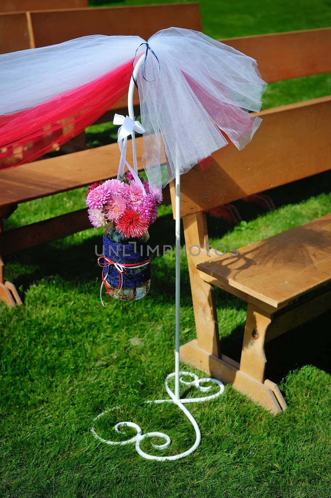 wedding decorations outdoors on green grass