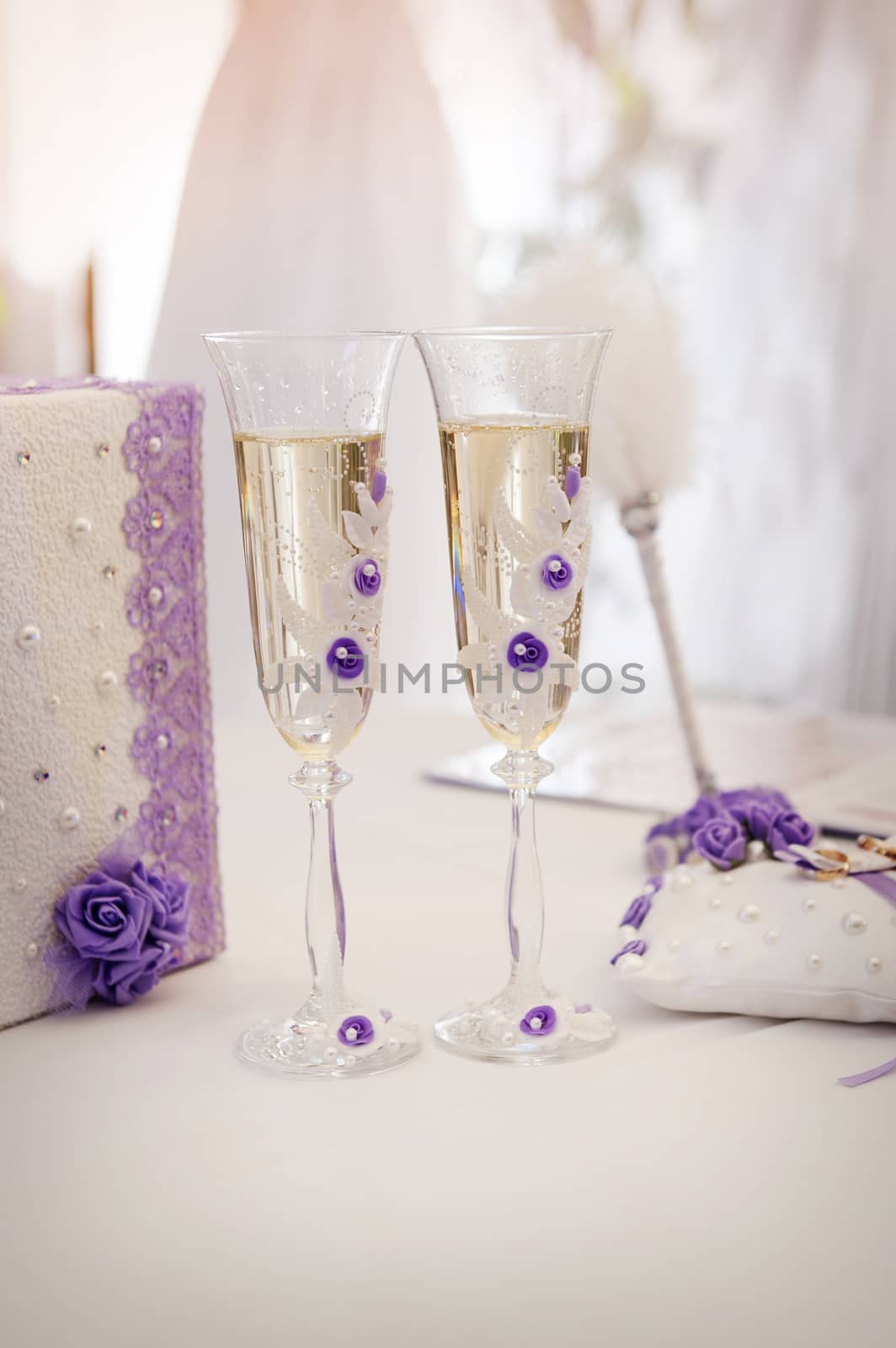 Two wedding glasses with champagne