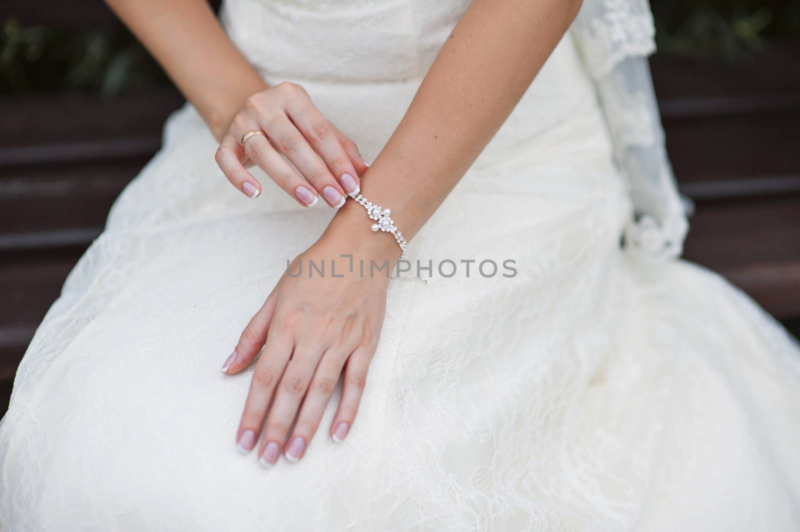 Wedding gloves on hands of bride, close-up 