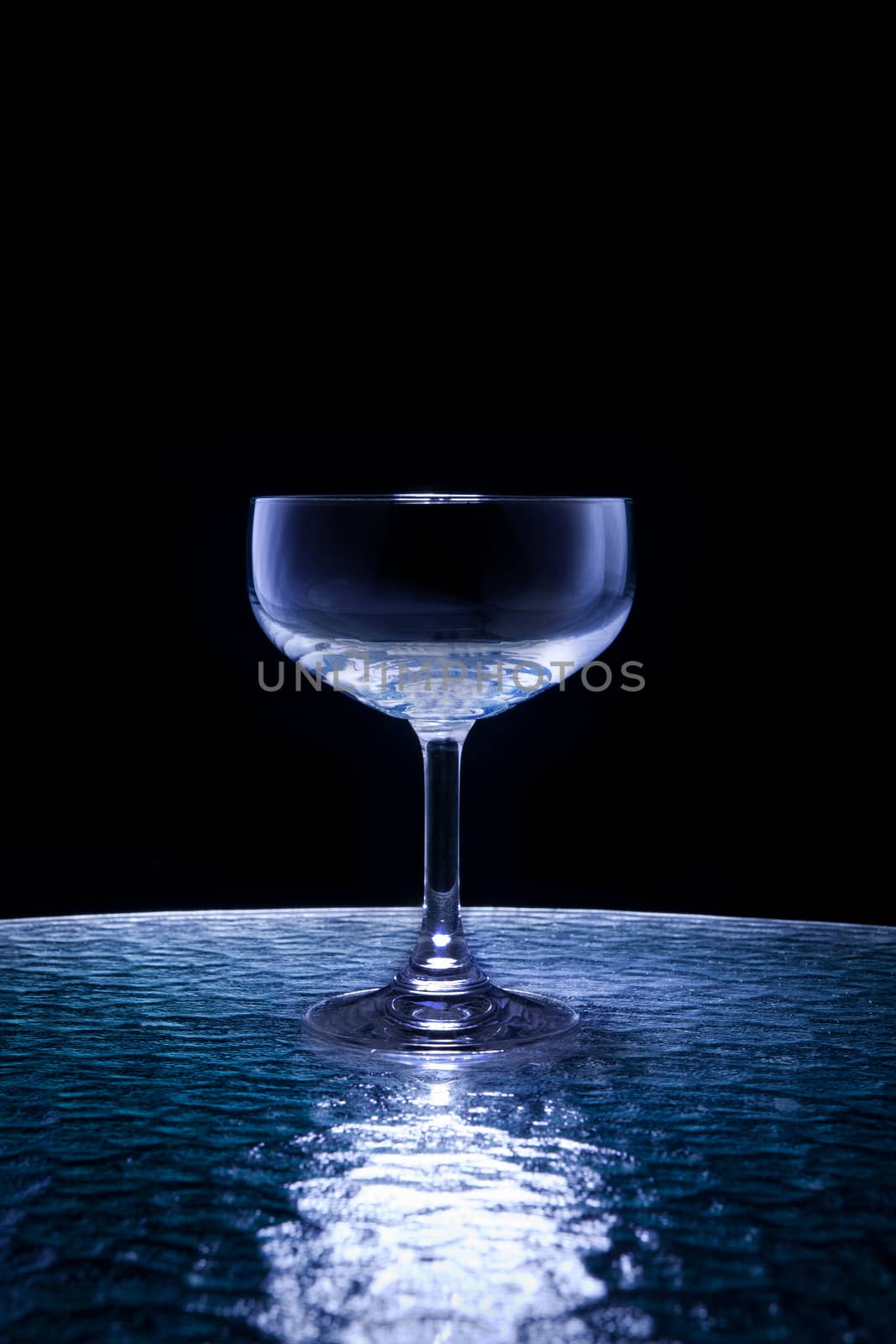 champagne glass on black by khunaspix