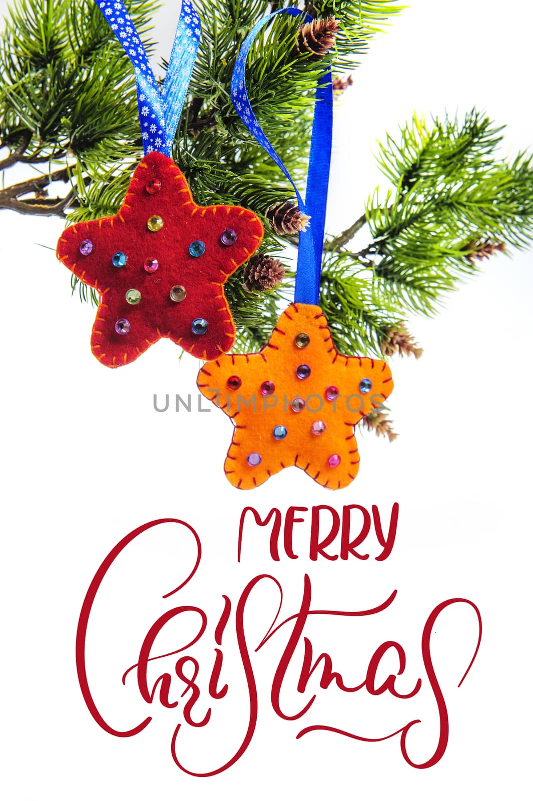 abstract background star decoration and fir hanging with text Merry Christmas. Calligraphy and lettering.