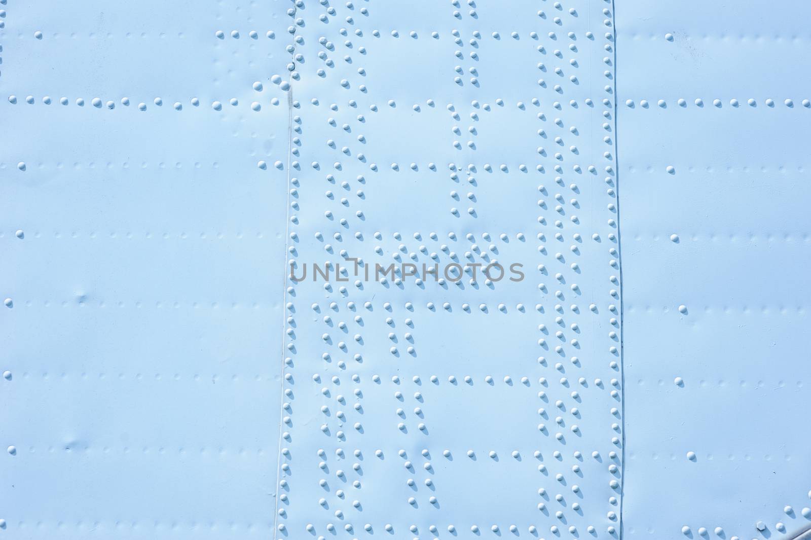 texture of covering the plane with buttons background