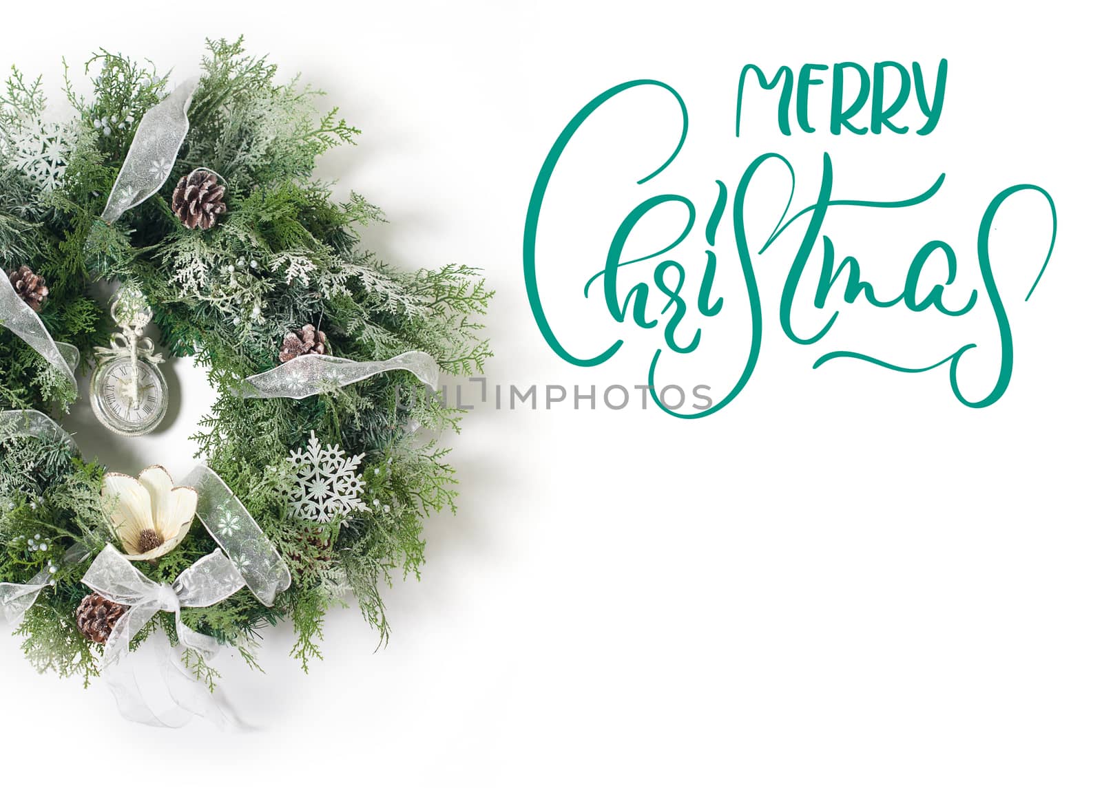 Christmas wreath on white background. Calligraphy lettering.