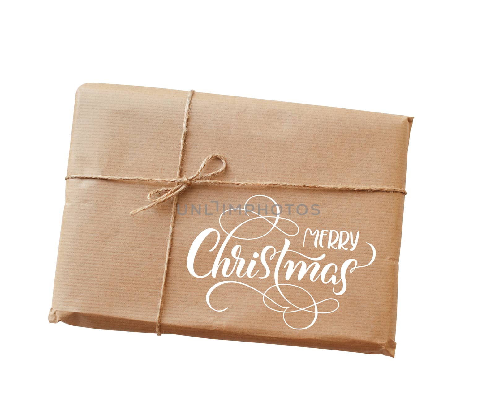 envelope kraft paper tied with string and text Merry Christmas. Calligraphy lettering.