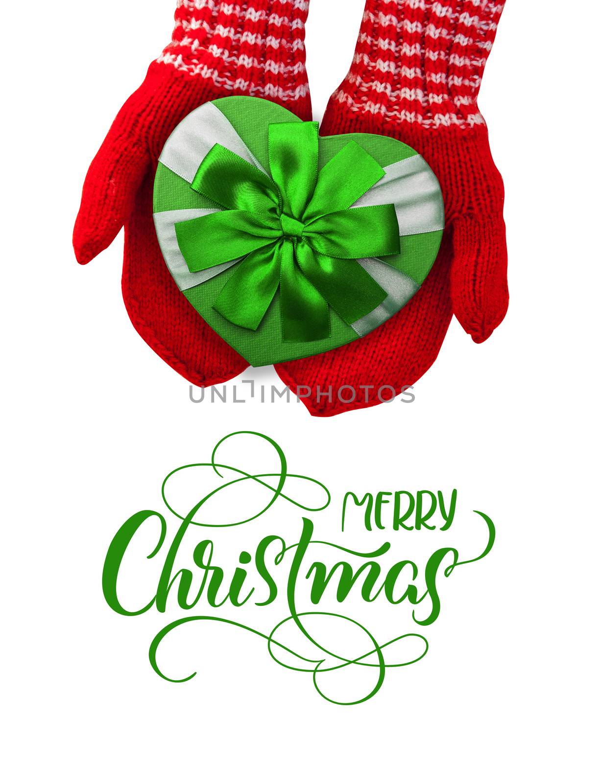 woman with red gloves holding gift in the shape of a heart and text Merry Christmas. Calligraphy lettering.