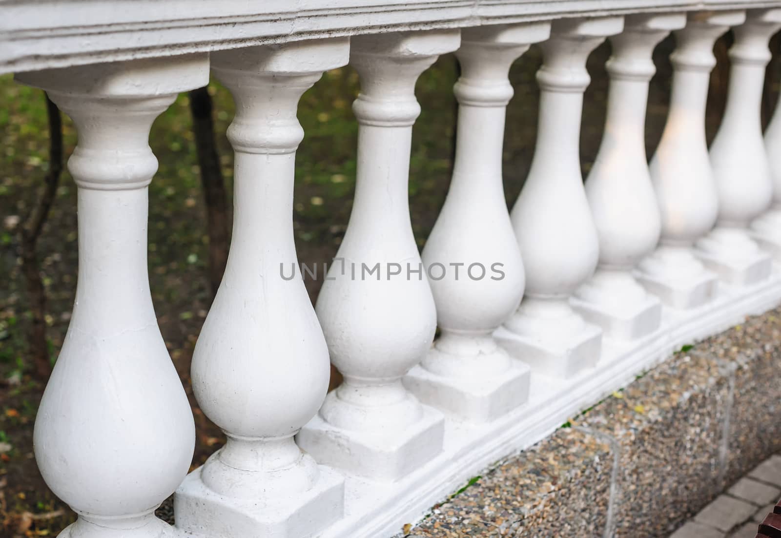 white balusters made of cement, architectural element.