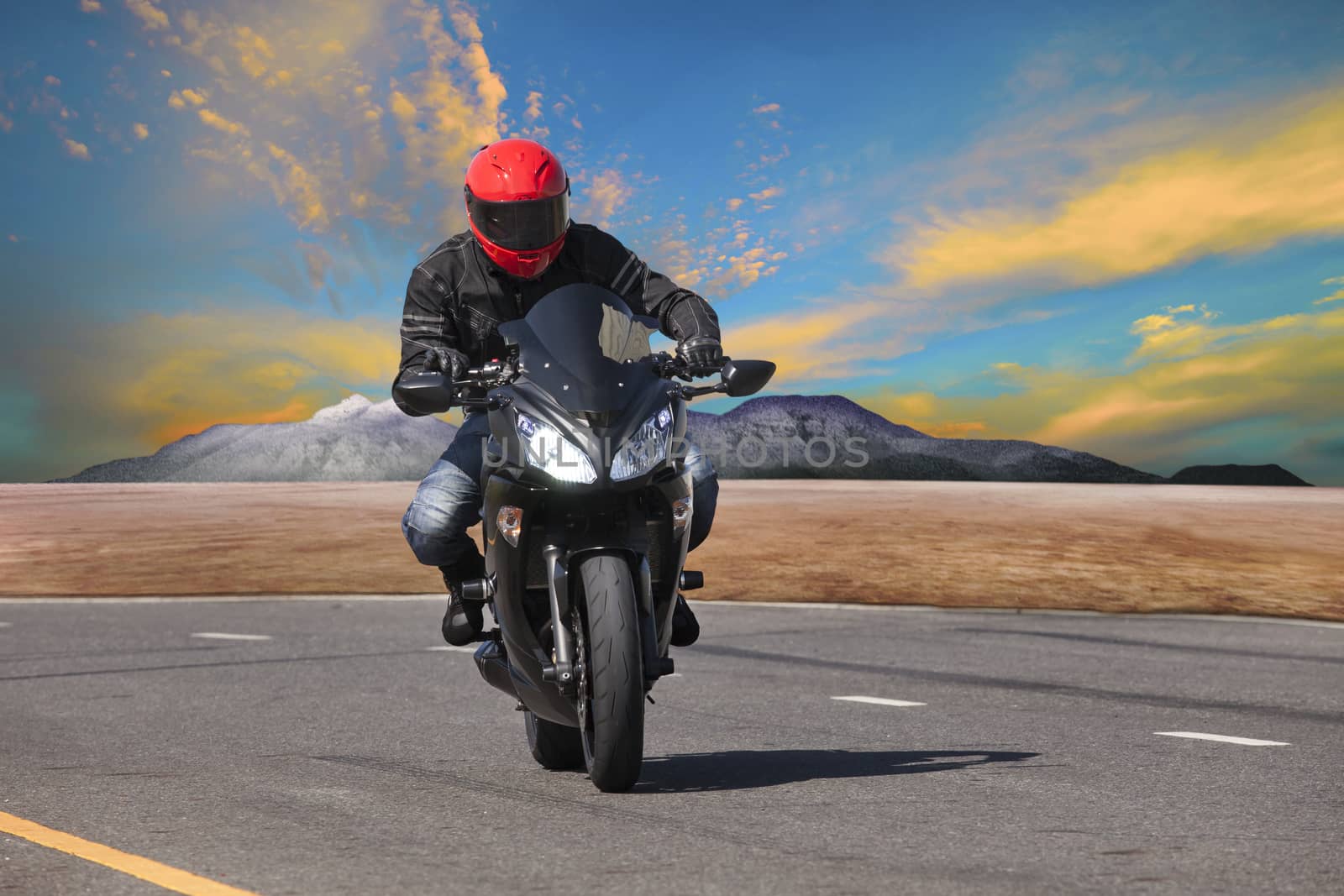 young man riding motorcycle in asphalt road curve use for extreme sport leisure