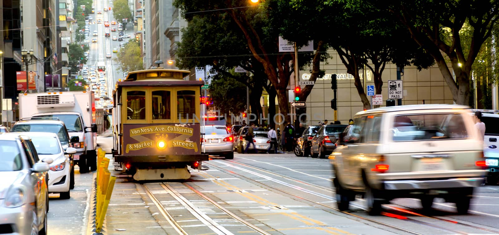 San Francisco, CA, USA, october 22, 2016; traditional Cable car in the traffic of San Francisco