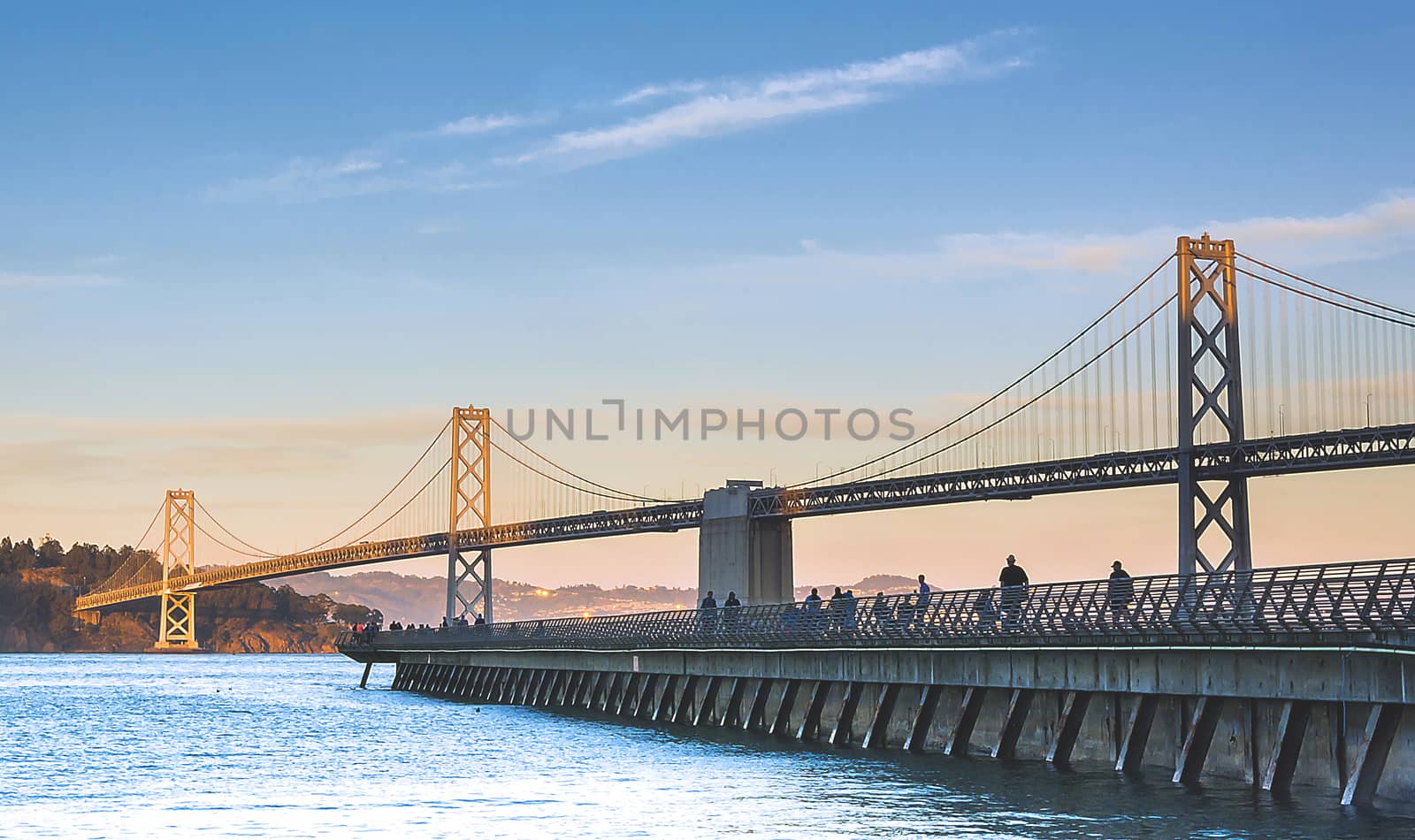 Bay bridge at sunset in a clear day