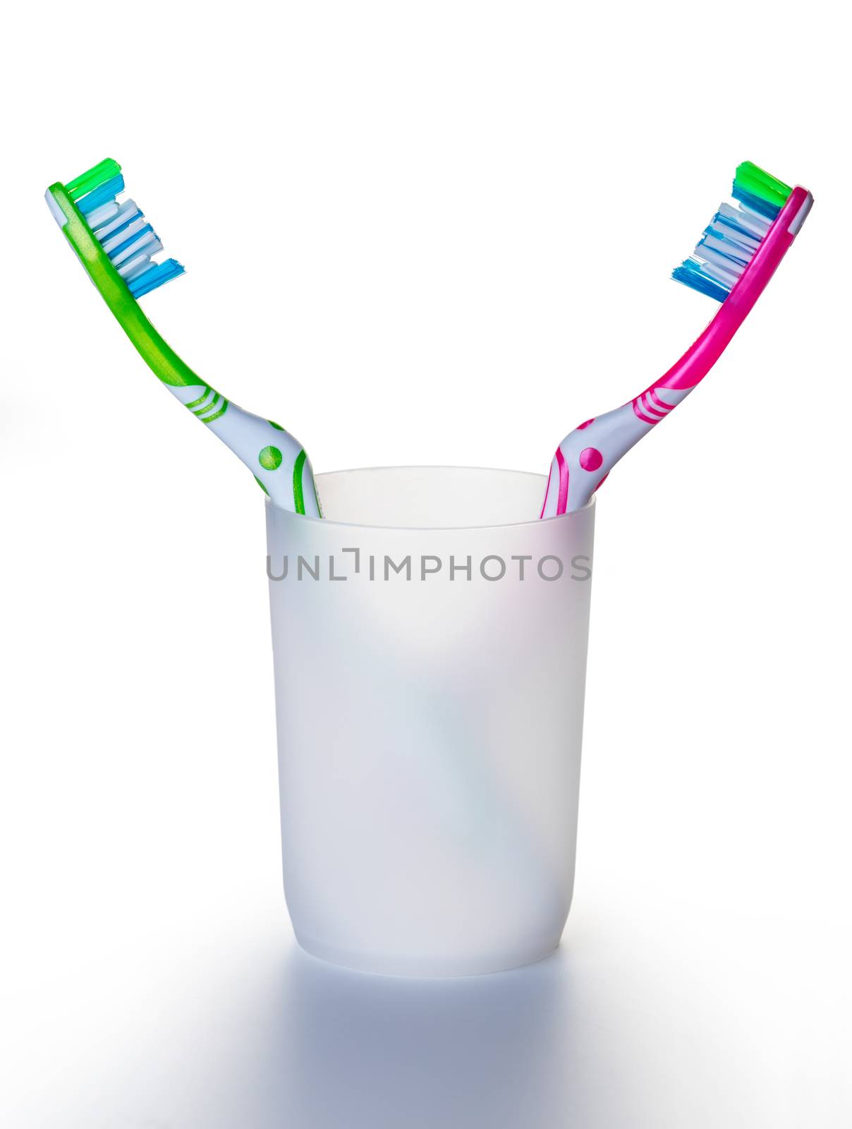 two toothbrushes in a glass  by MegaArt