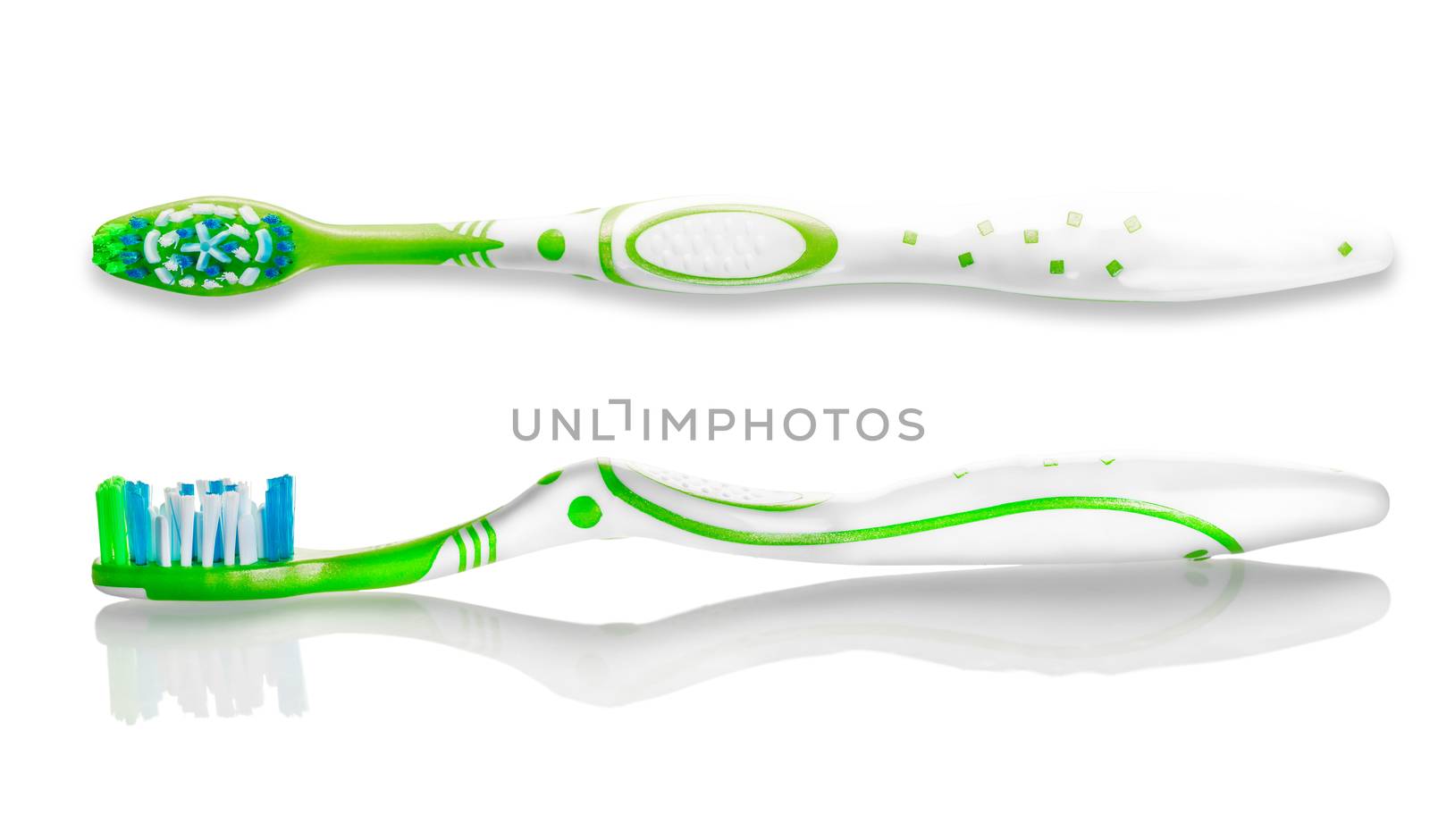 two toothbrushes closeup on against white background