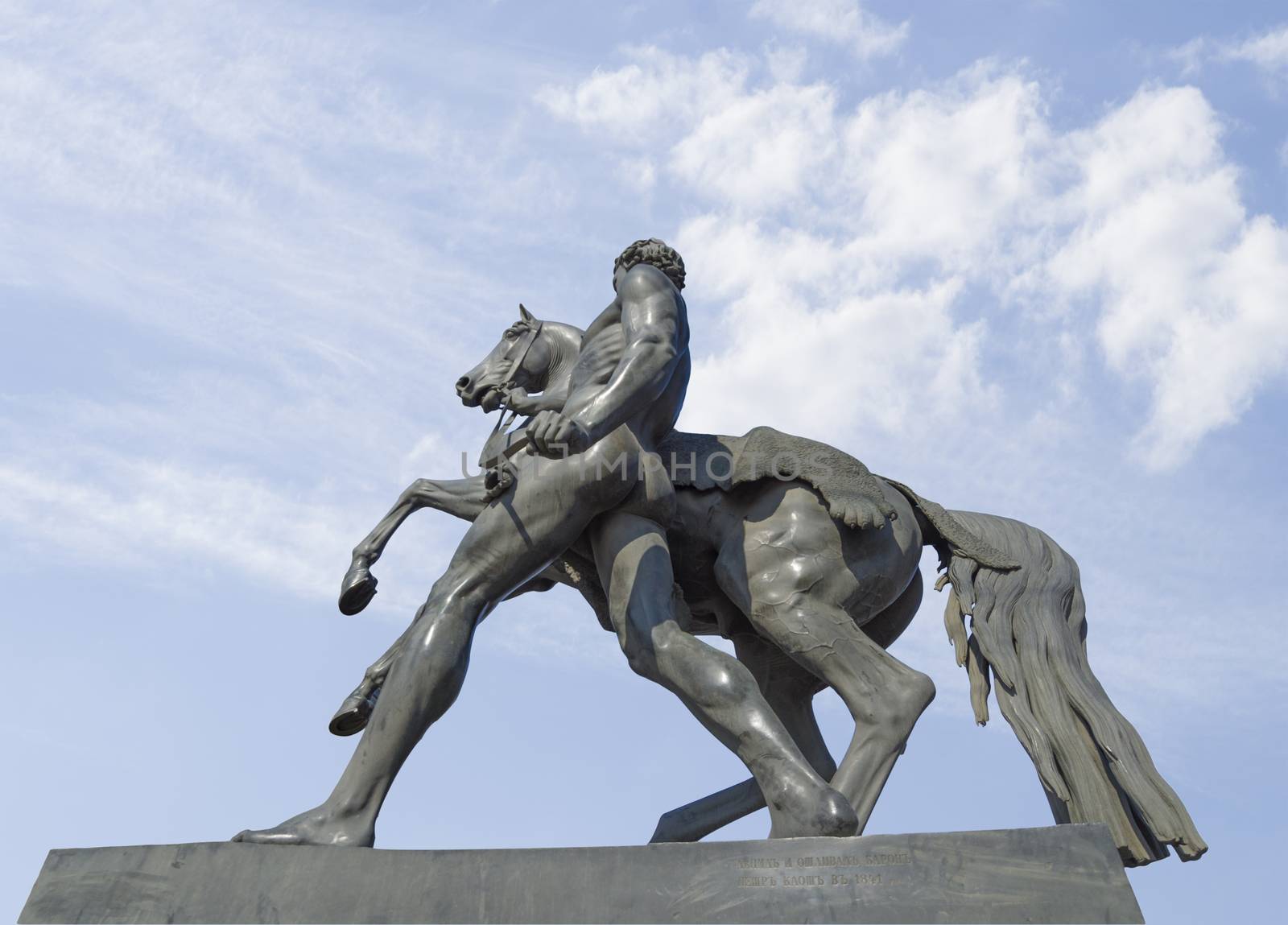 Horses sculpture Klodt on Anichkov bridge in St. Petersburg Russia