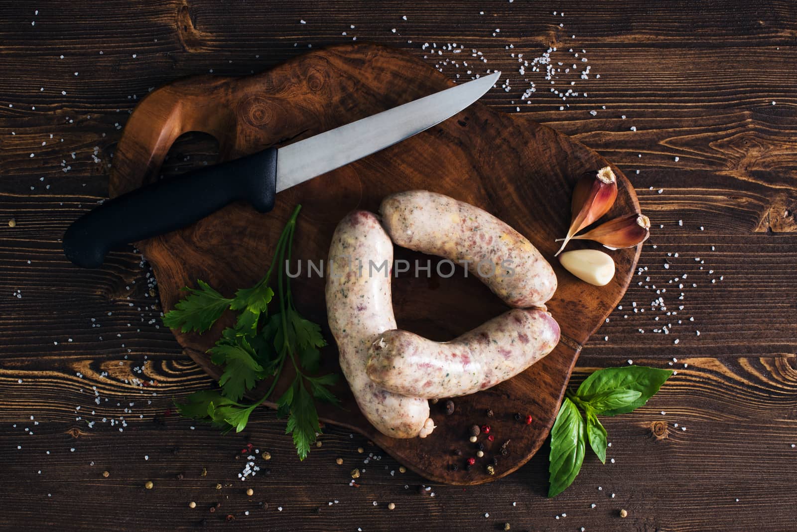 Raw sausages with garlic and parsley  by kzen