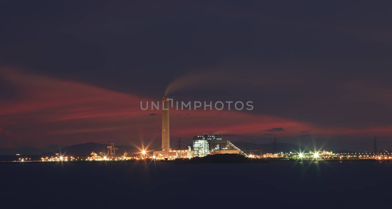 heavy industry in industrial estate and beautiful dramatic sky  by khunaspix