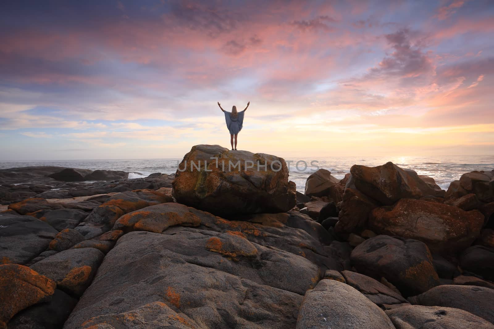 Rocky Landscape and Ocean at Sunrise by lovleah