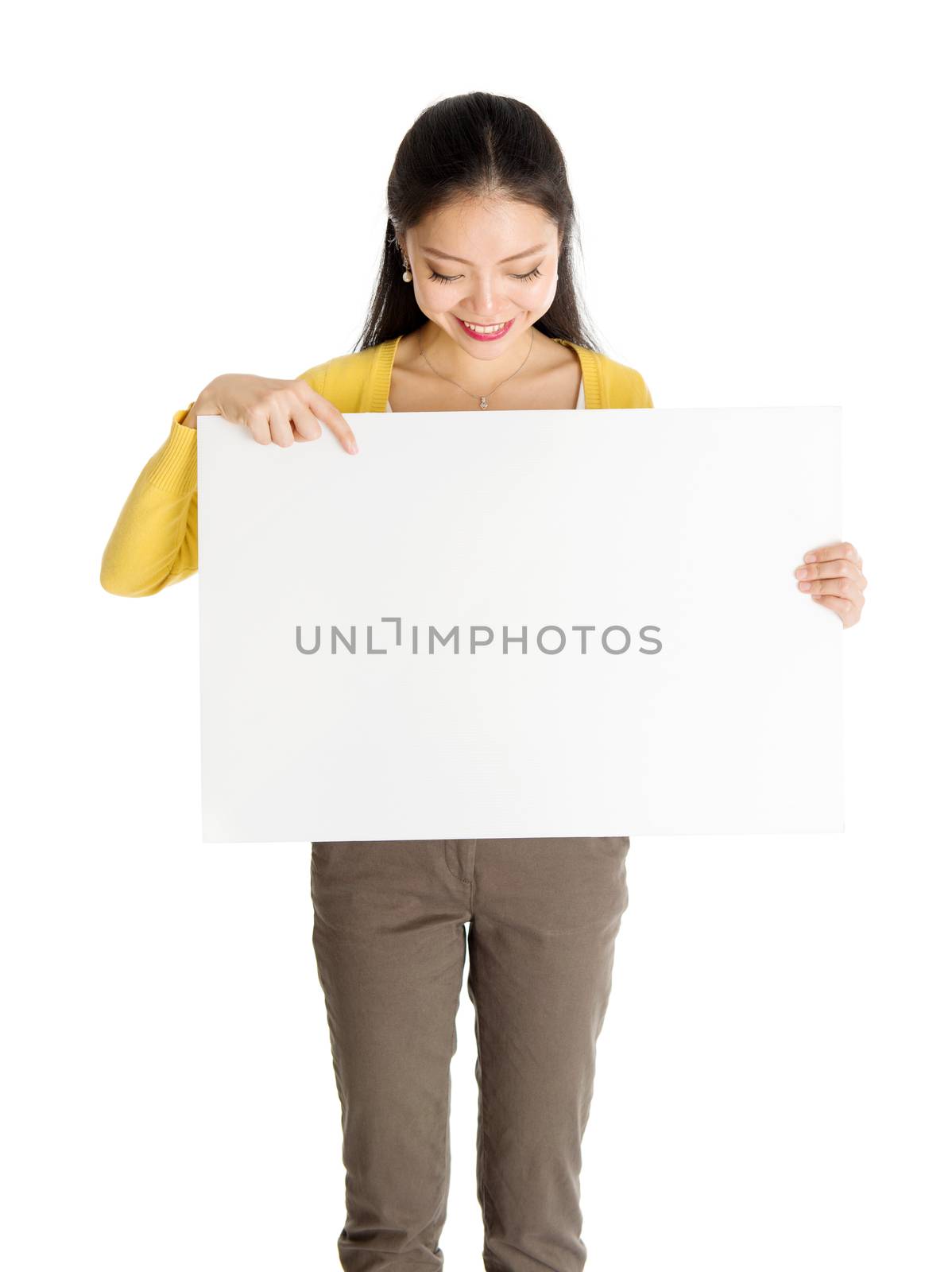 Asian woman holding white blank paper card by szefei