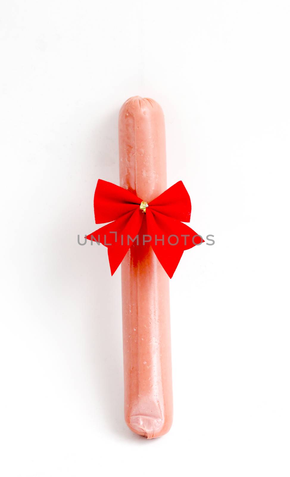 red ribbon bow-tie on a sausage on a white background