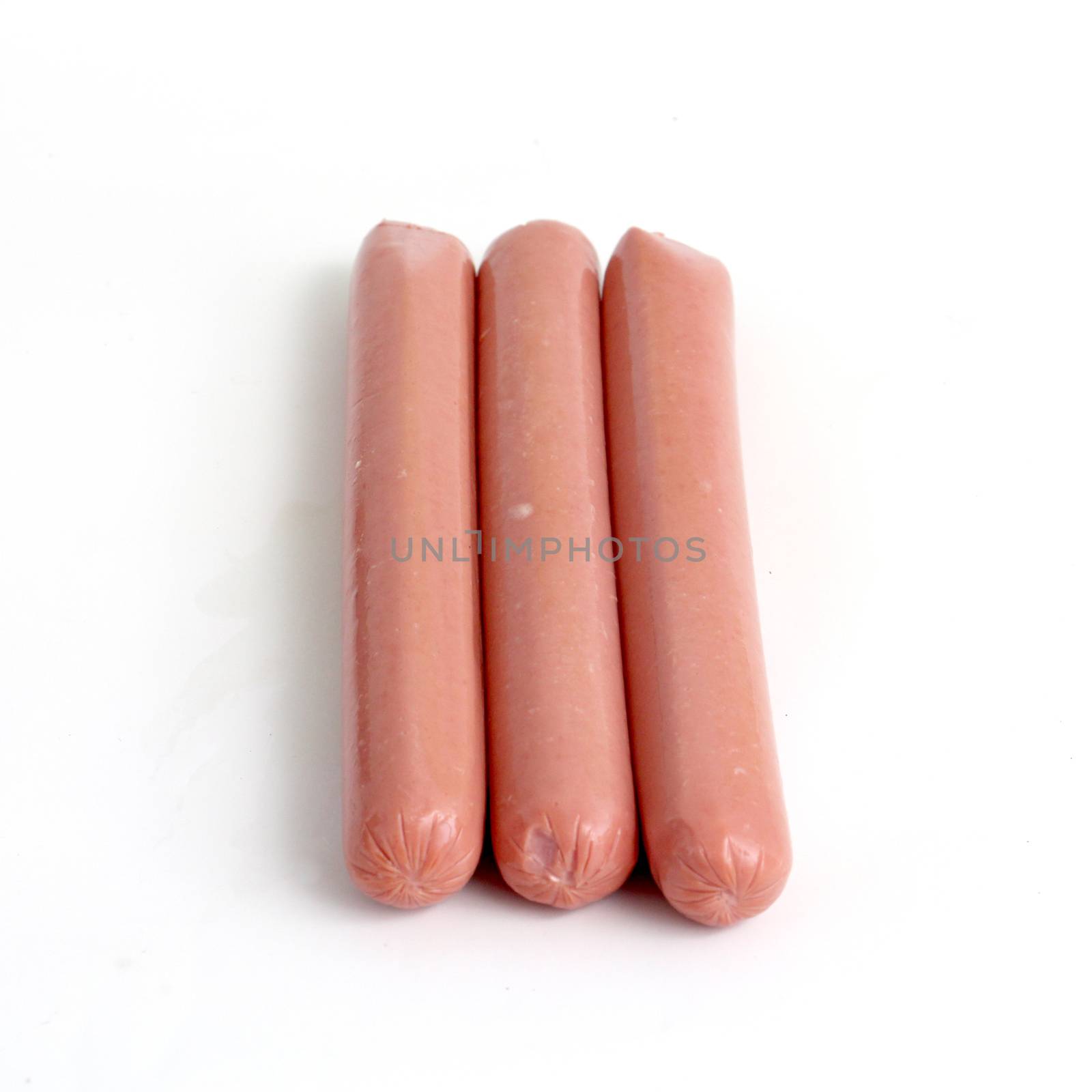 picture of a hot dog sausages on white background