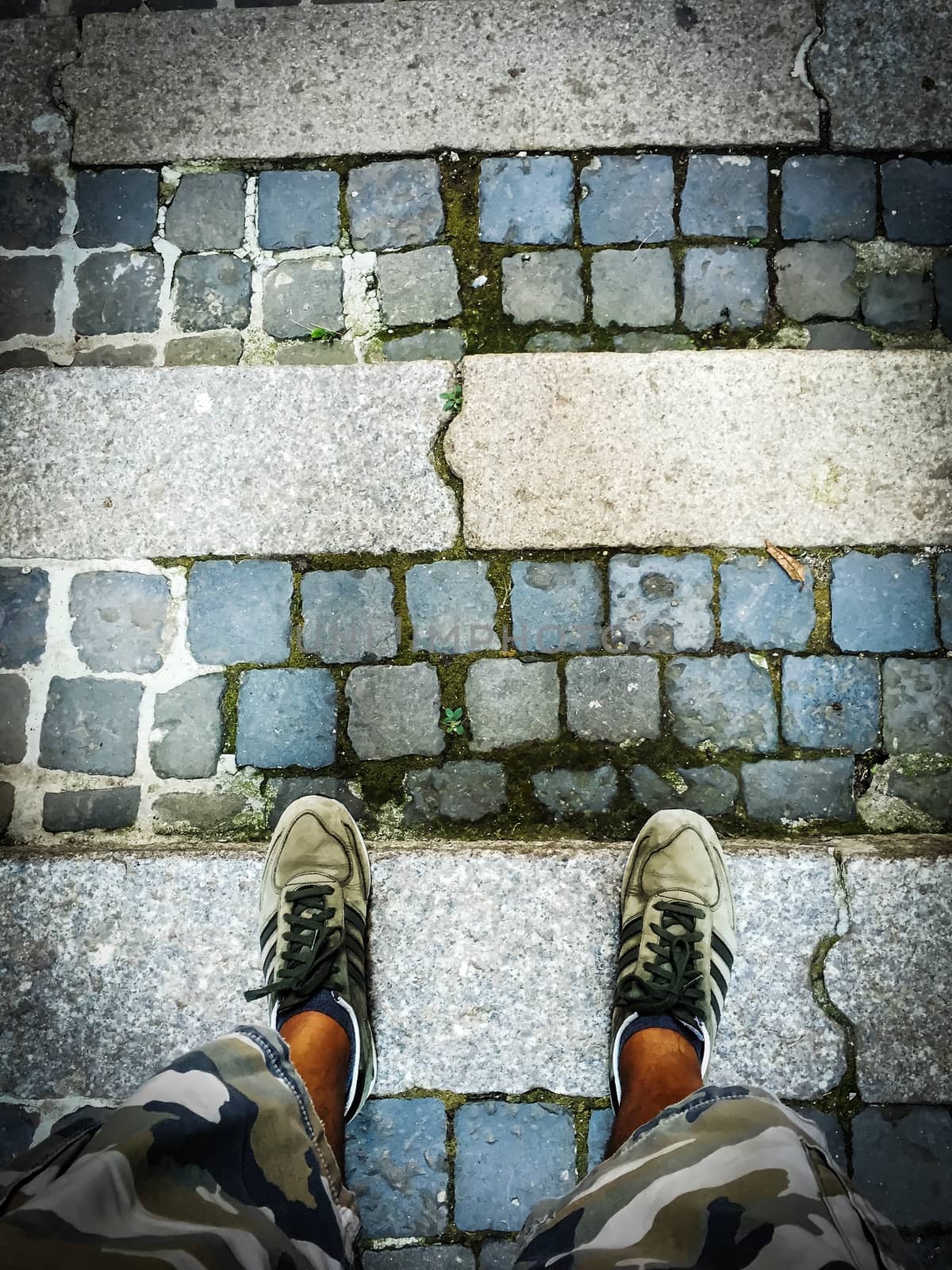 walk on roman cobblestone in a summer day