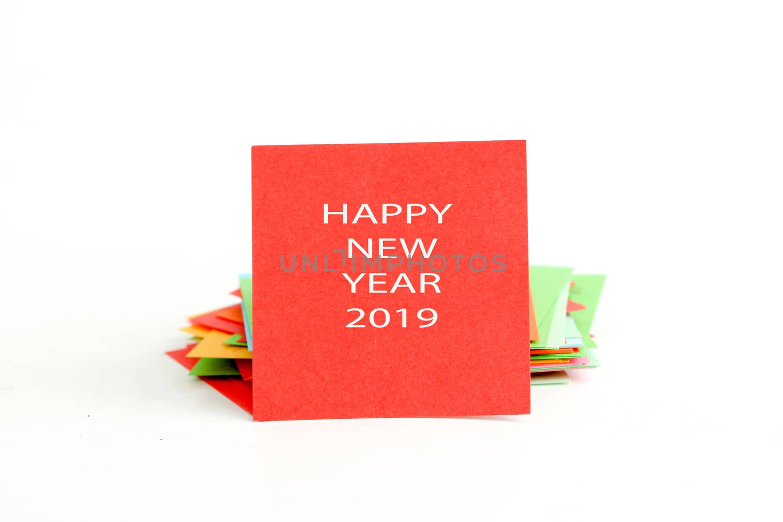 picture of a red note paper with text happy new year 2019