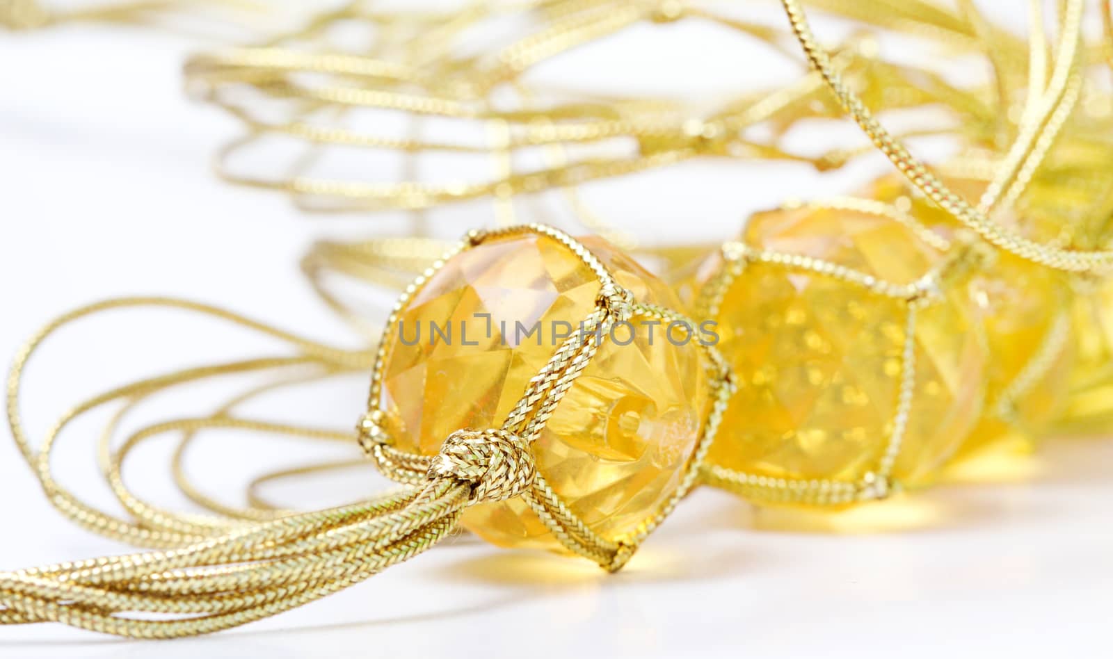 necklace with cheap plastic gems with golden colored rope by nehru