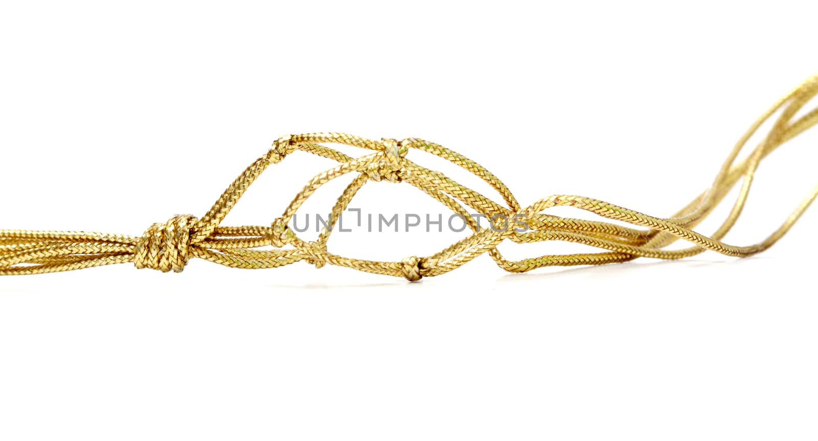gold colored rope by nehru