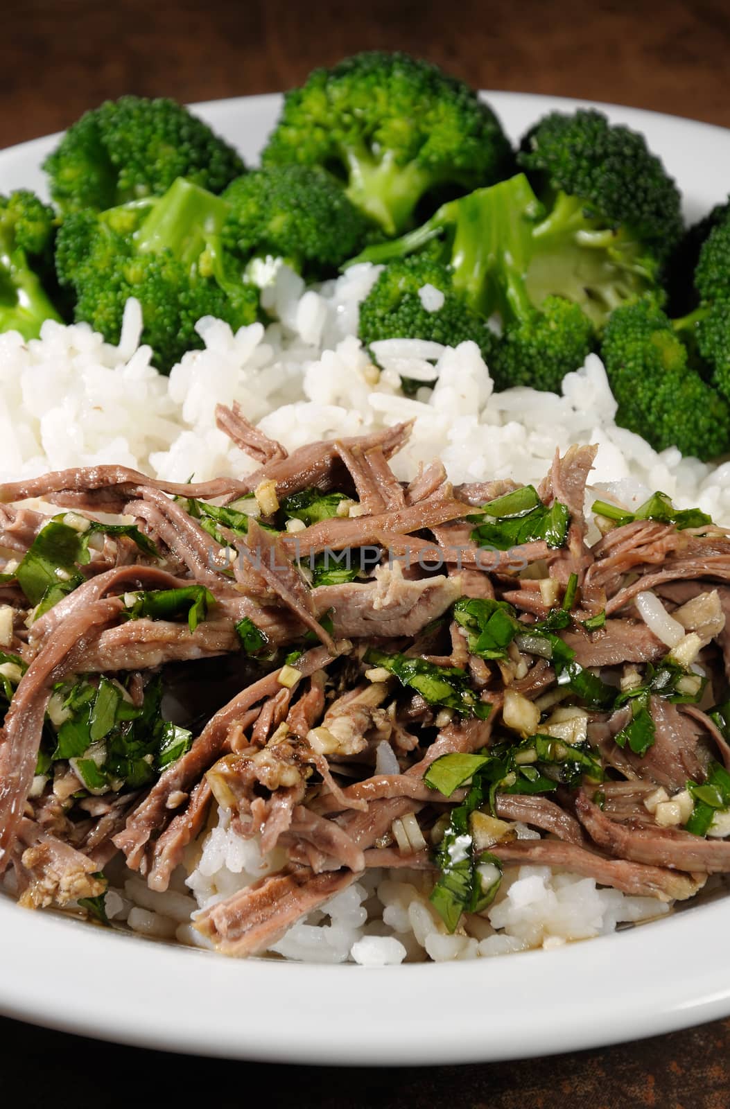 boiled beef with pungent spokes sauce garnish rice with broccoli
