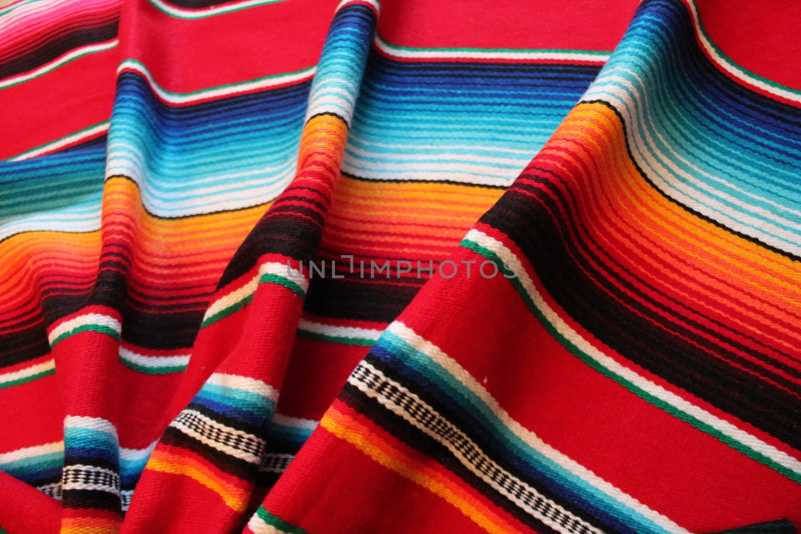 Mexico traditional cinco de mayo rug poncho fiesta background with stripes copy space