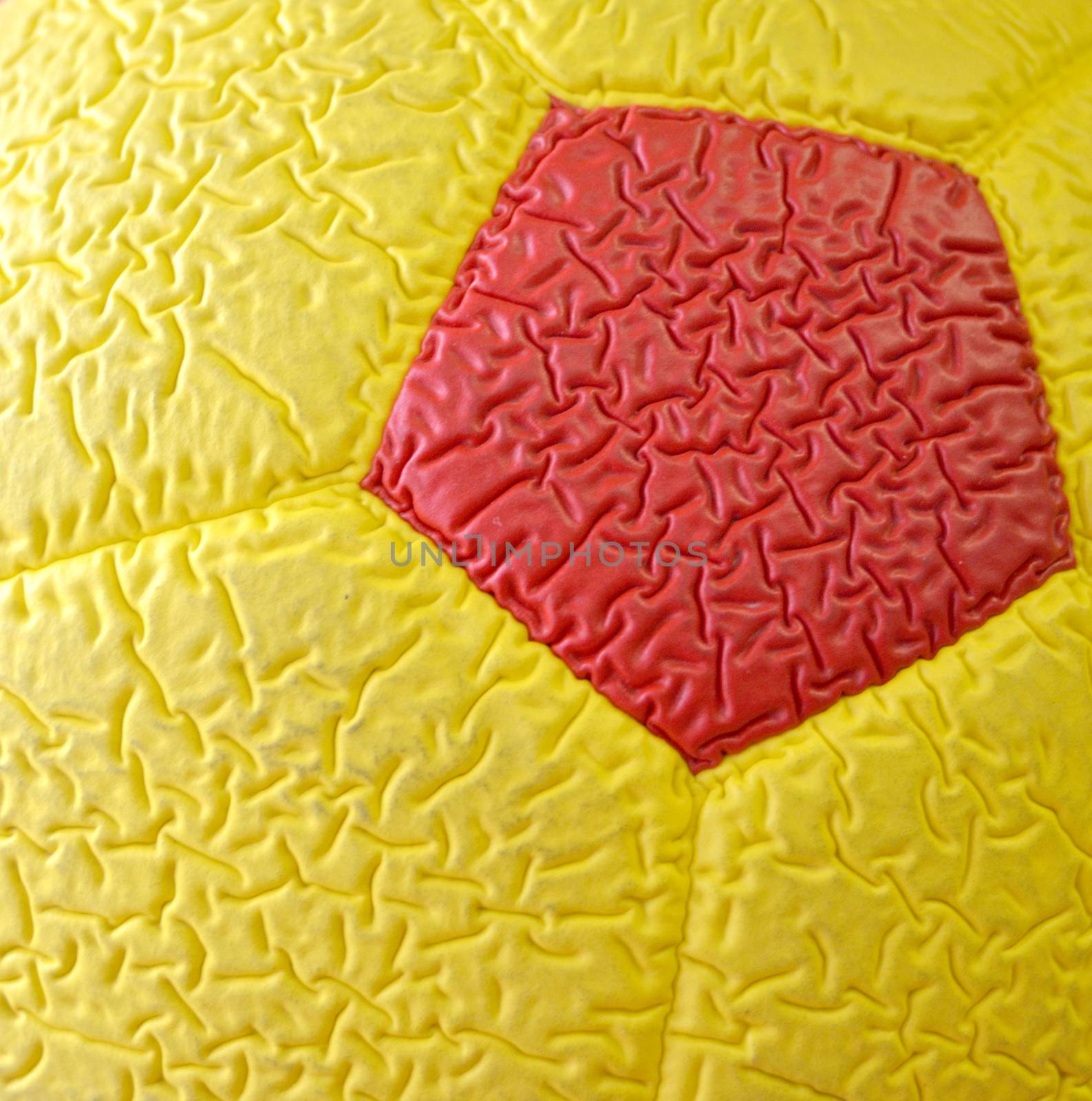 picture of a Red and yellow Soccer Ball macro, texture