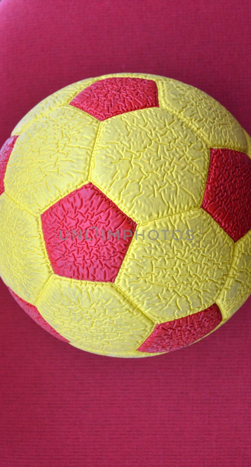 picture of a Red and yellow Soccer Ball macro, texture