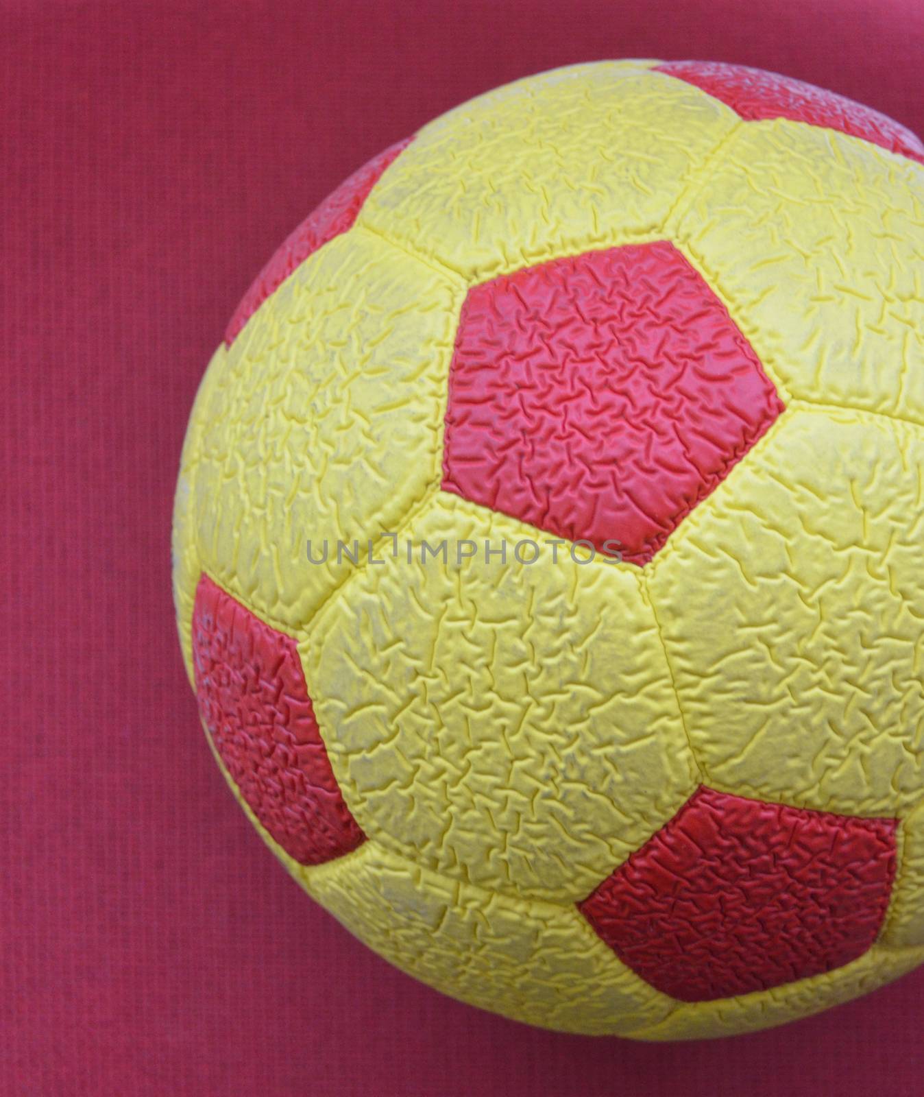 picture of a Red and yellow Soccer Ball macro, texture