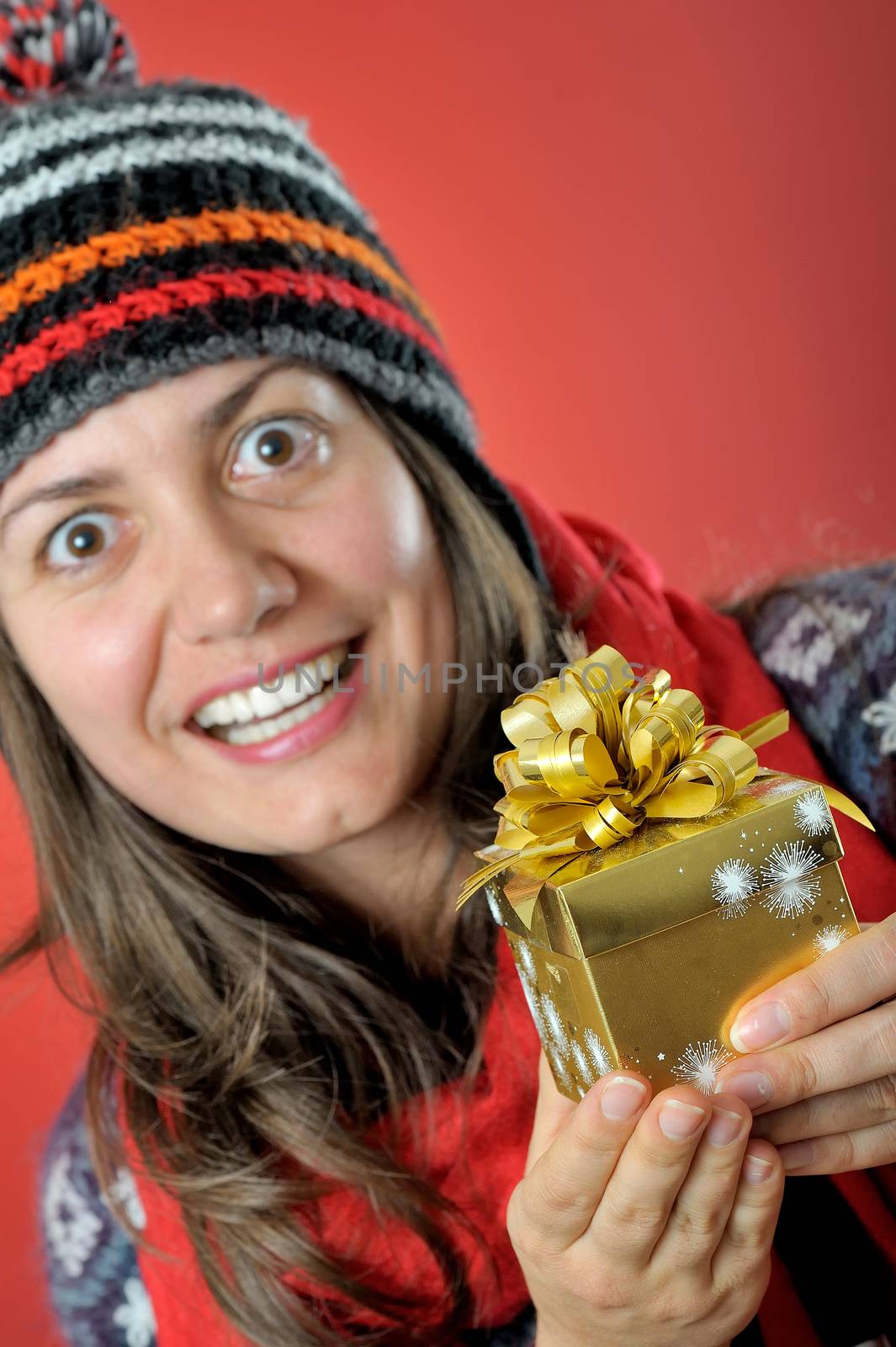 Young woman with Christmas present box by jordachelr
