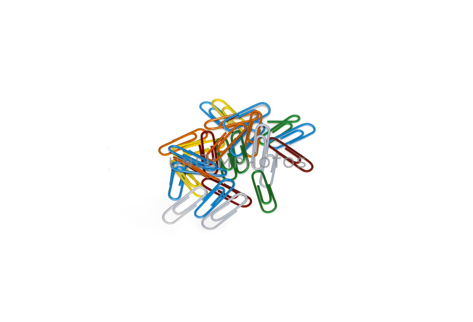 Set of colorful paperclips isolated on a white background.