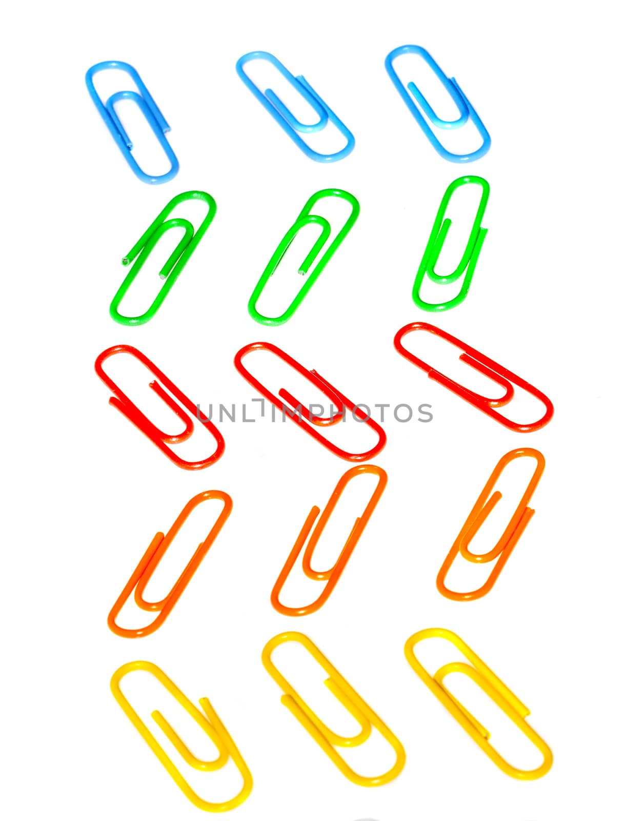 Color photo paperclips on a white background