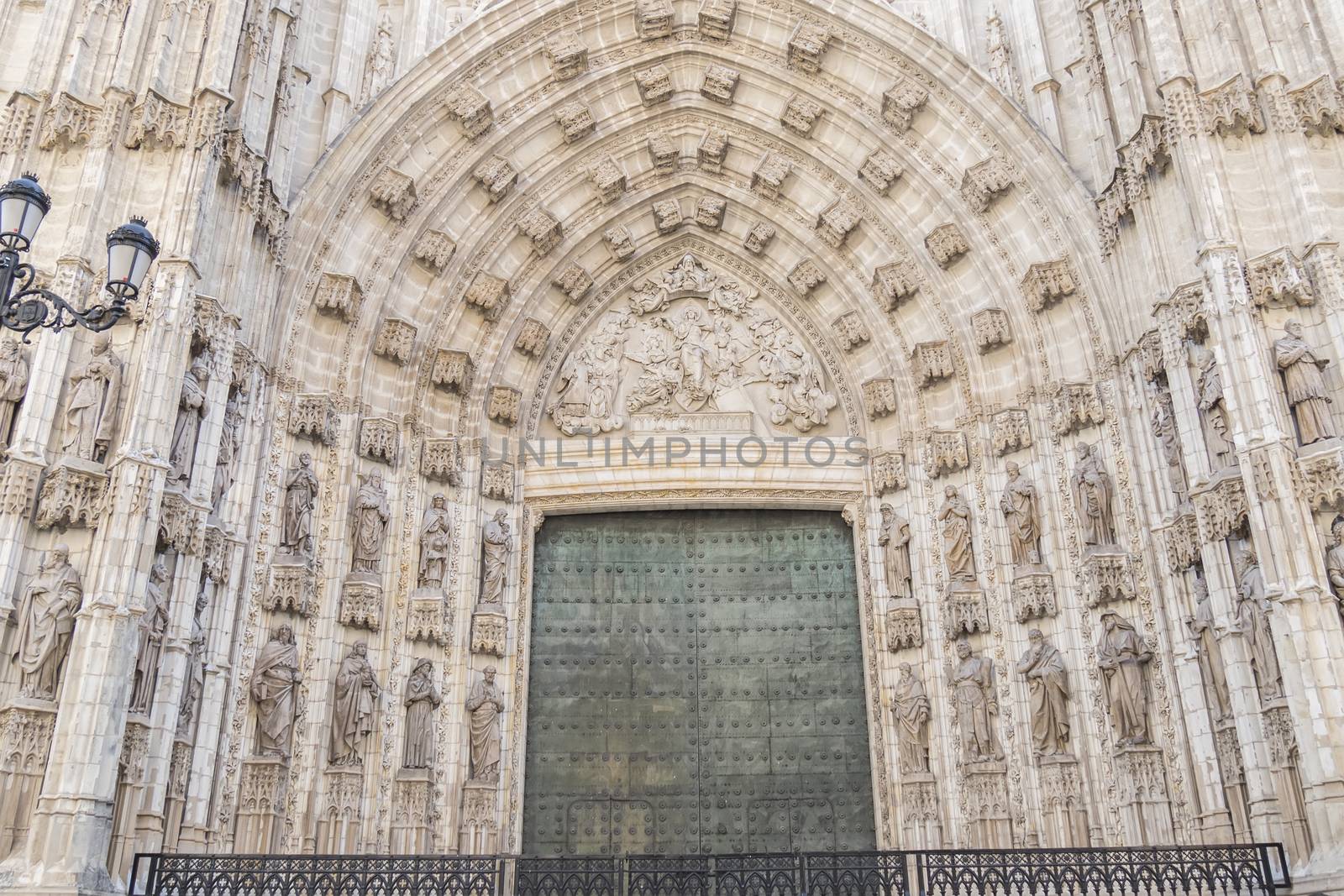 Door of Assumption (Spanish: Puerta de la Asuncion) of the Sevilla Cathedral (Spanish: Catedral de Santa Maria de la Sede) in Spain, main portal of the west facade.