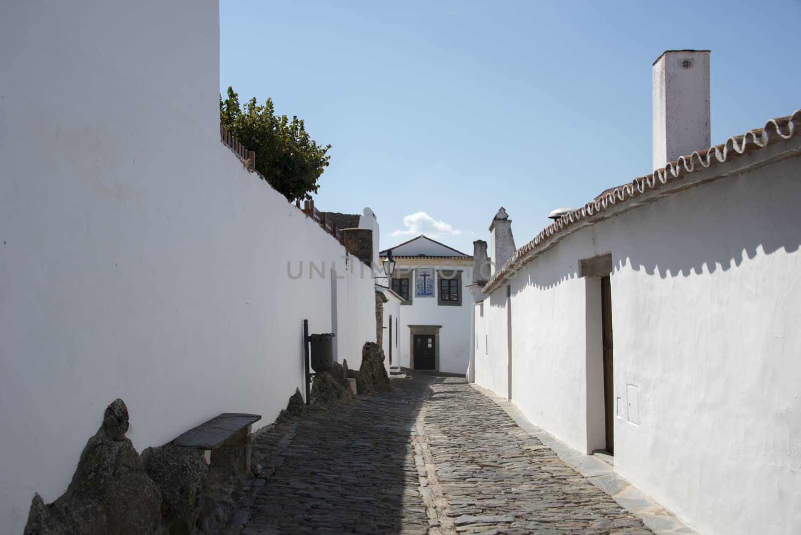 street with white houses monsaraz in alentejo portugal