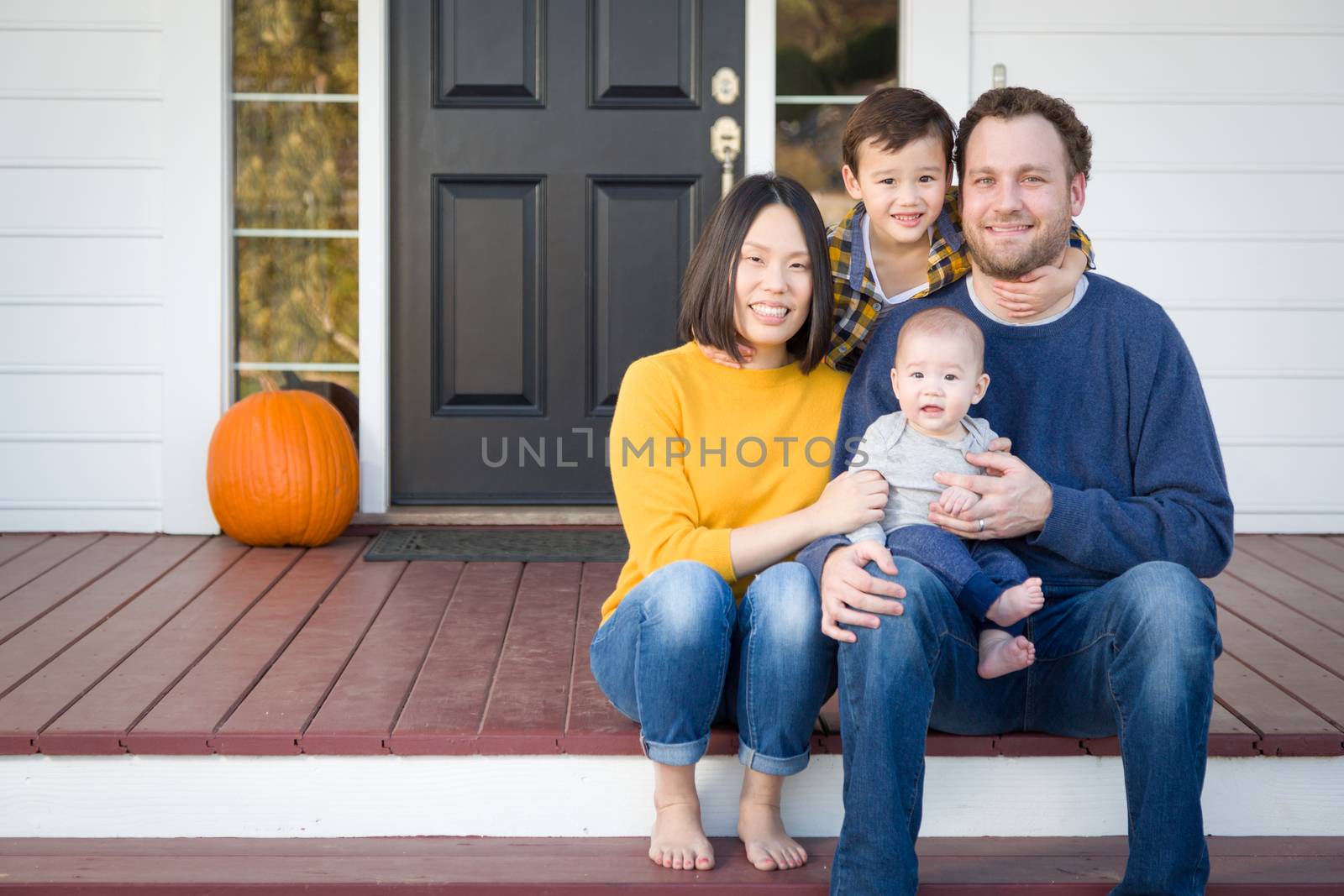 Young Mixed Race Chinese and Caucasian Family Portrait by Feverpitched