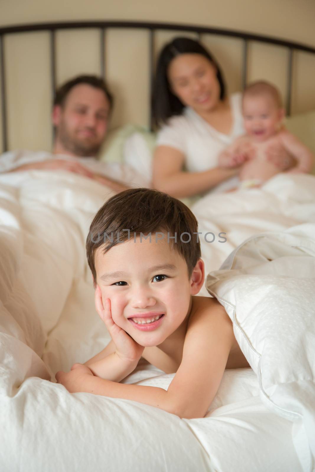 Mixed Race Chinese and Caucasian Boy Laying In Bed with His Fath by Feverpitched