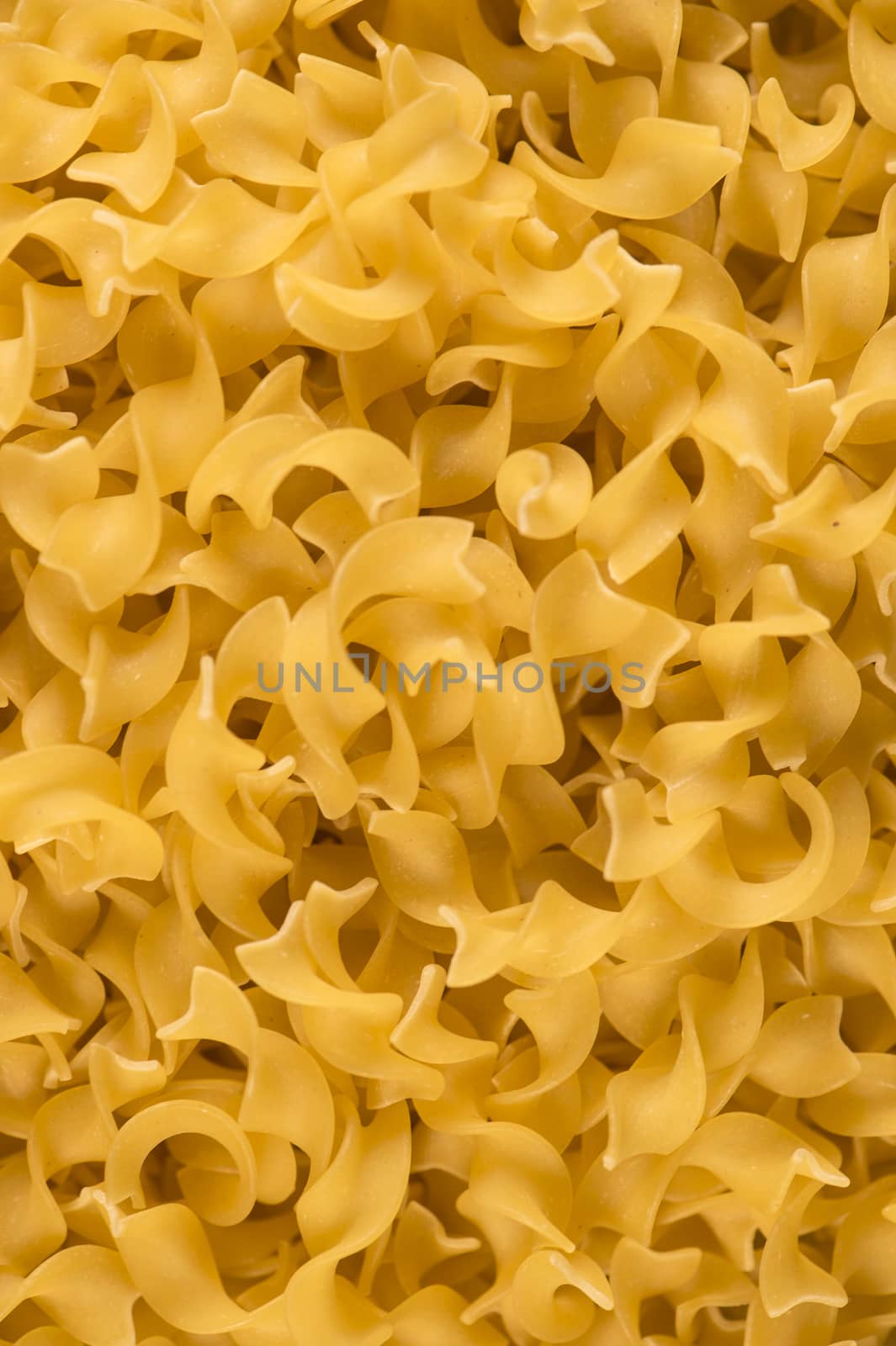 Full background of dry uncooked pasta, Food