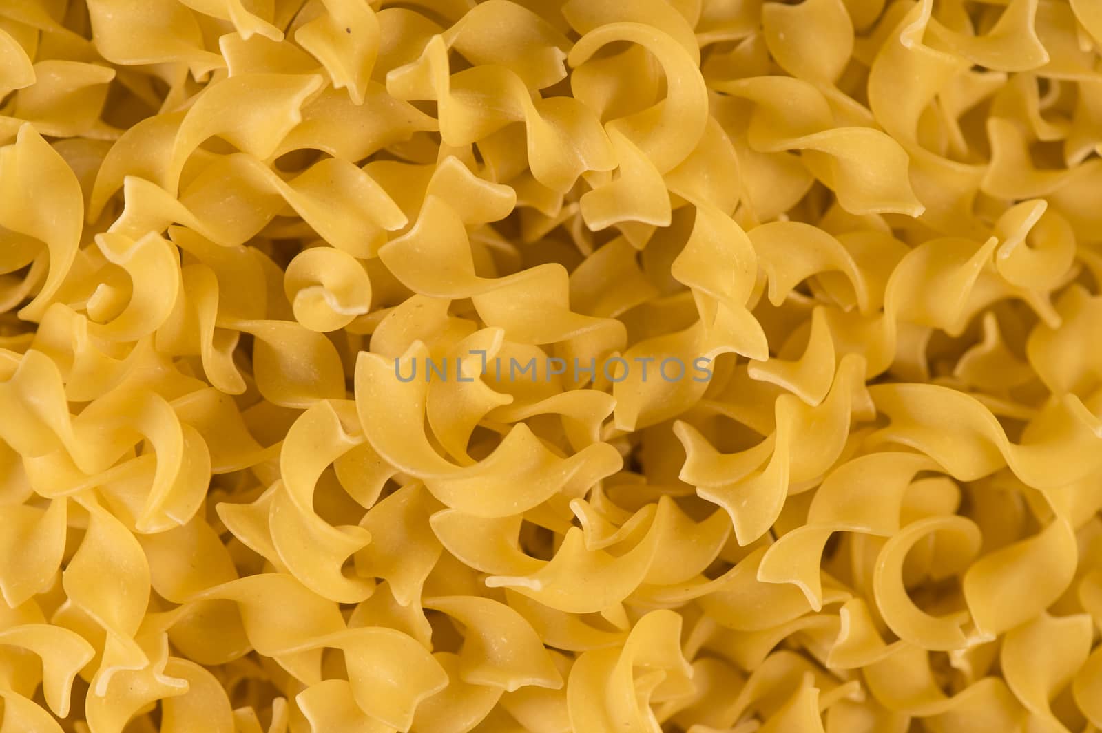 Full background of dry uncooked pasta, Food
