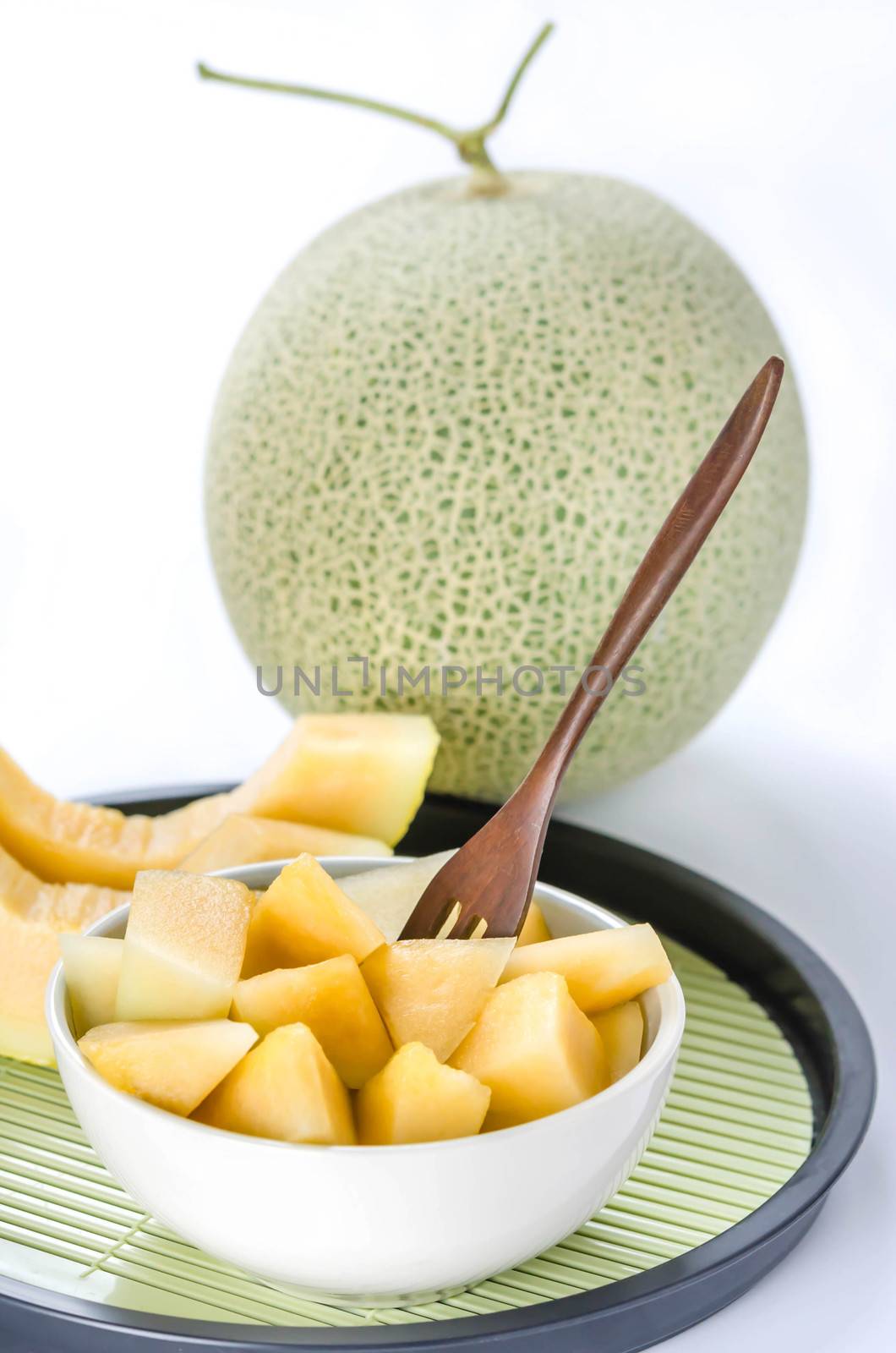 cut cantaloupe melon by rakratchada