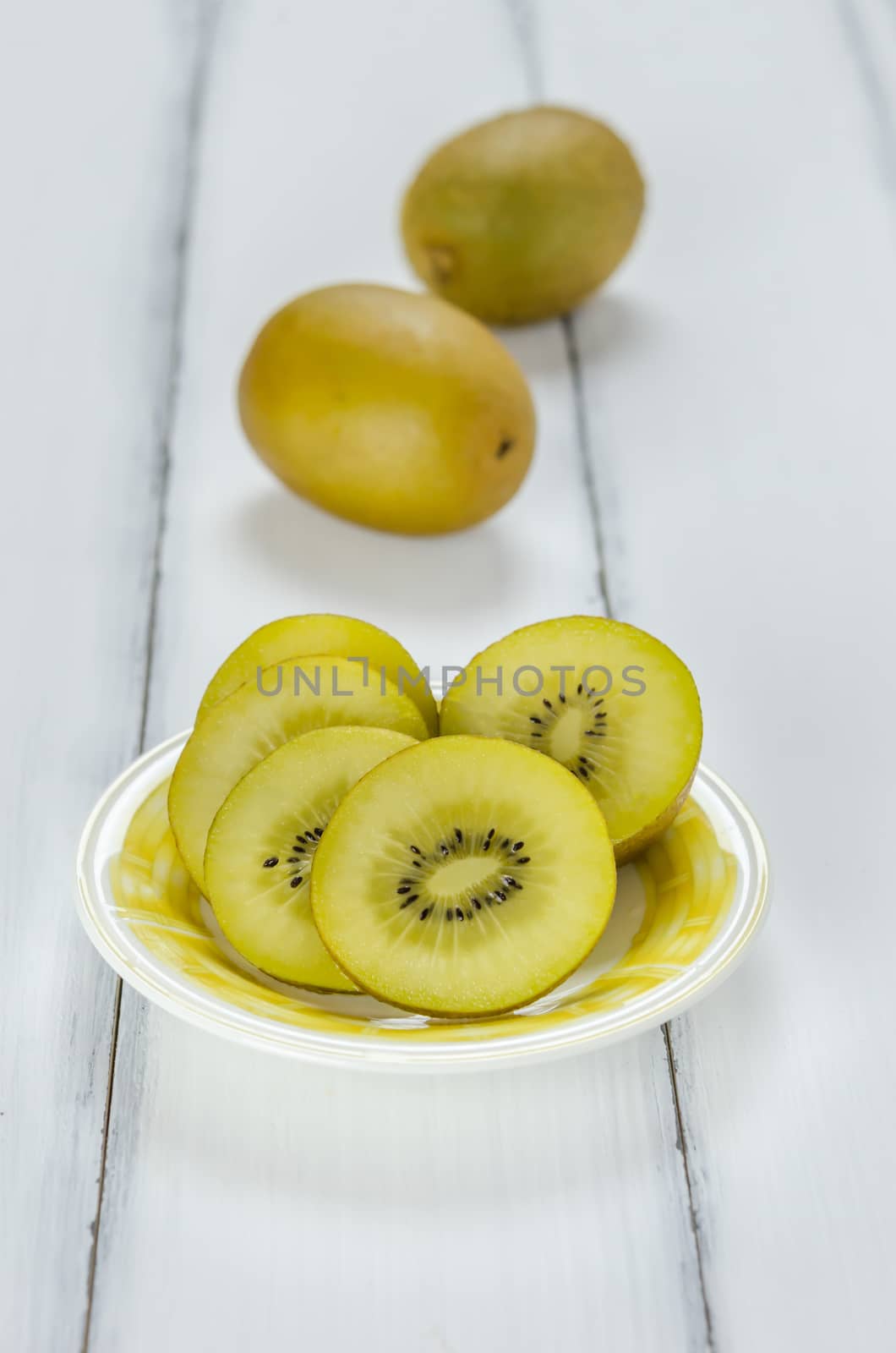 golden kiwi fruit by rakratchada