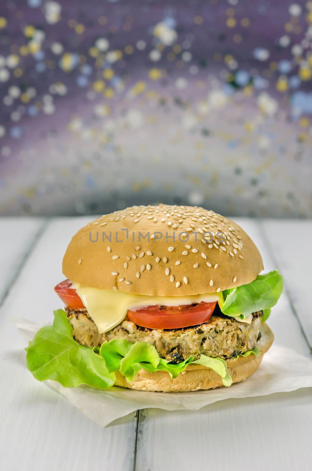 Closeup of home made burgers on wooden background