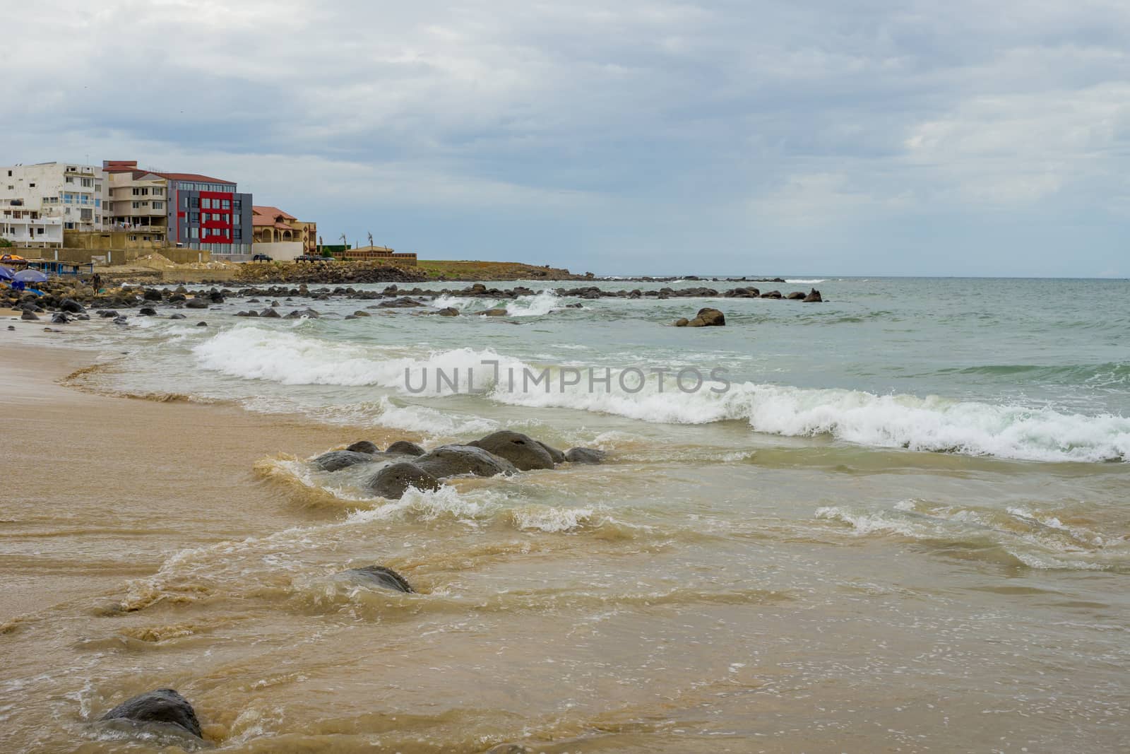 Waves of the Atlantic ocean hitting the beaches along the shores of Dakar, Senegal