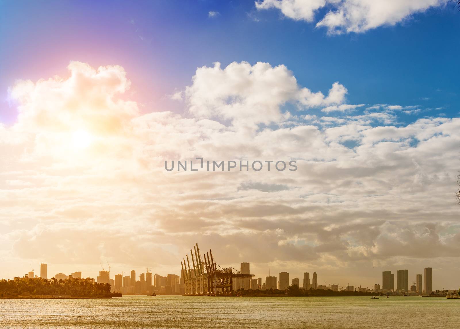 The view on Dodge Island and Downtown Miami, Florida, from South Pointe Park in Miami Beach, on a hazy afternoon.