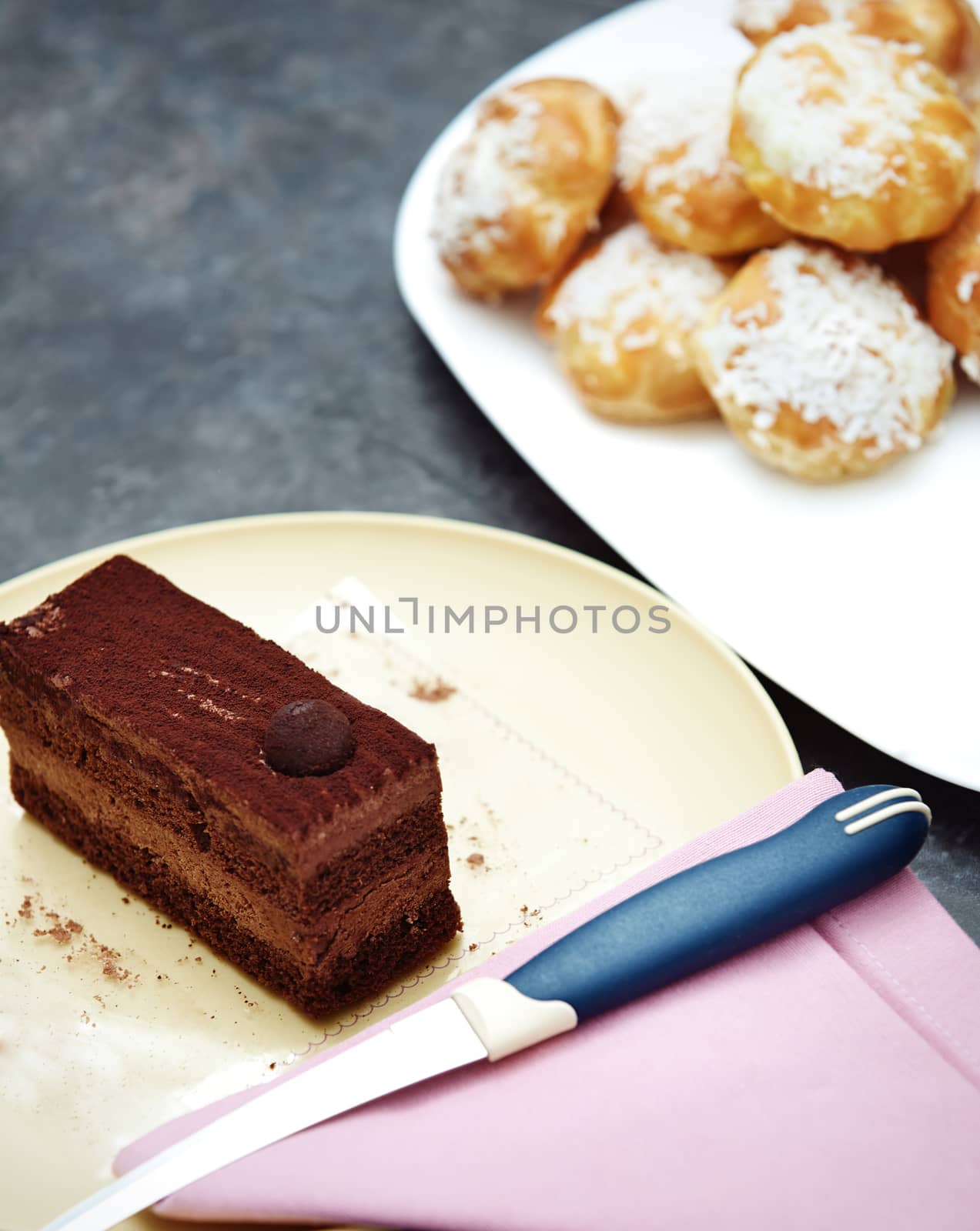 Chocolate cake and eclairs by Novic