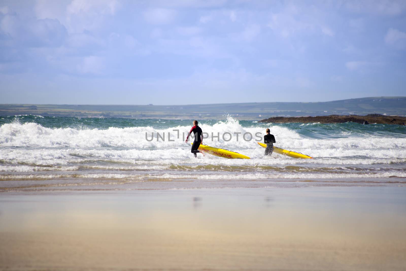 lifeguards training in the surf on ballybunion beach county kerry ireland