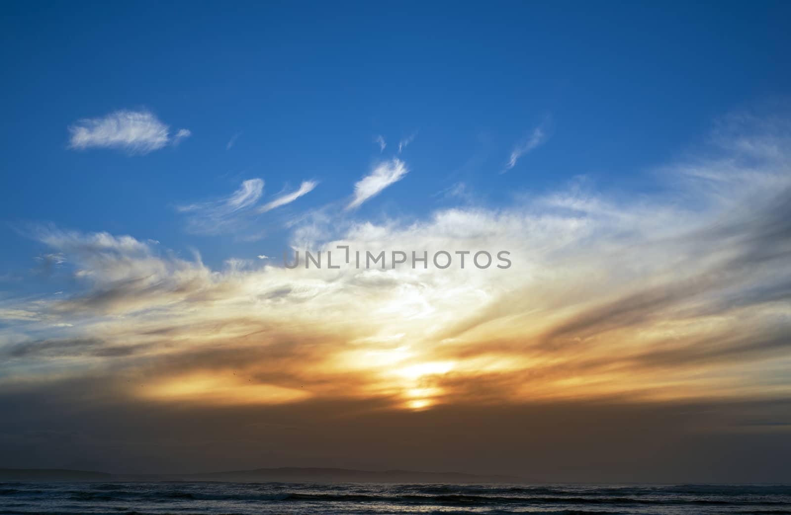 lovely sky over beach by morrbyte