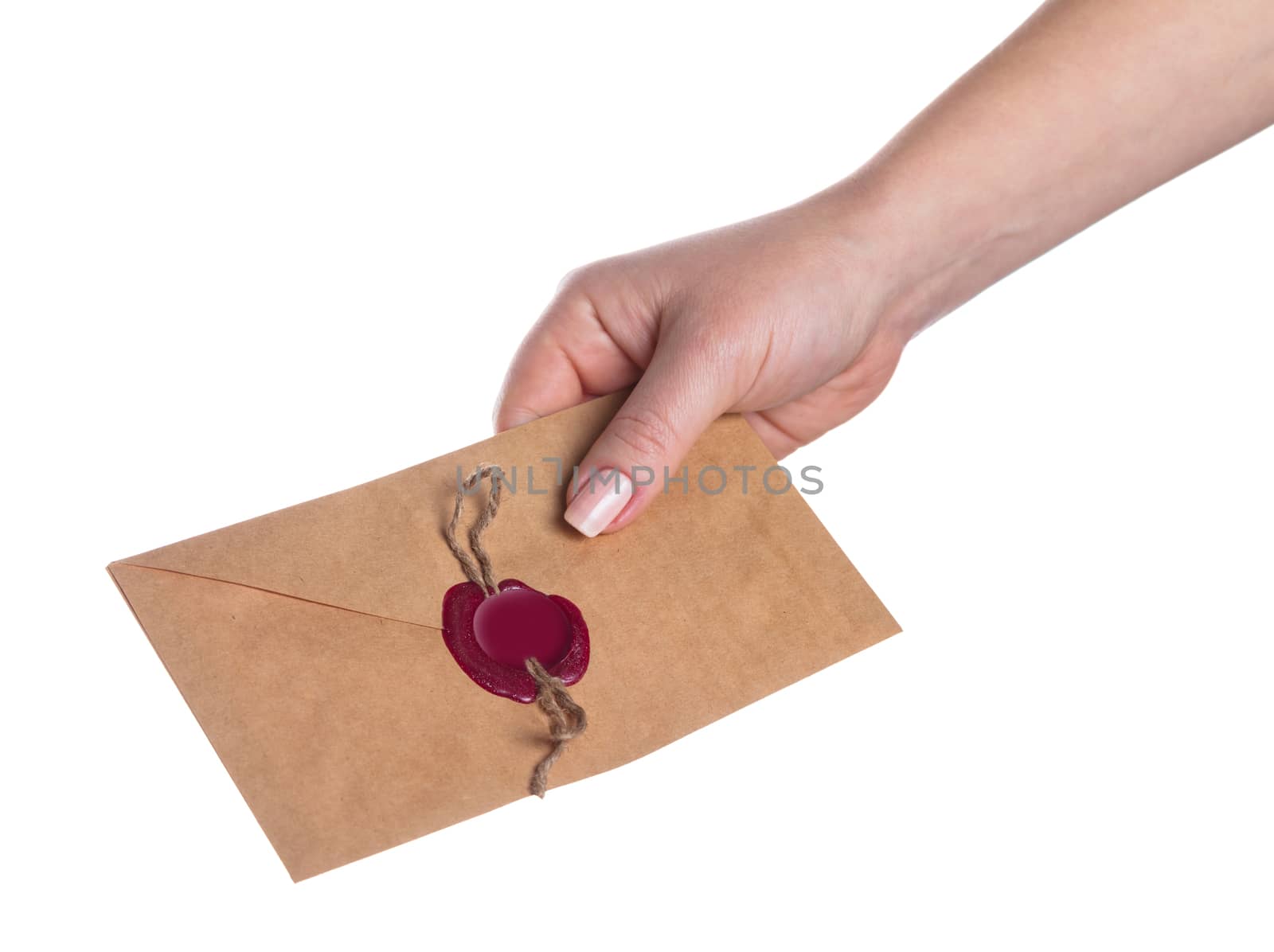 envelope in the hand on a white background isolated